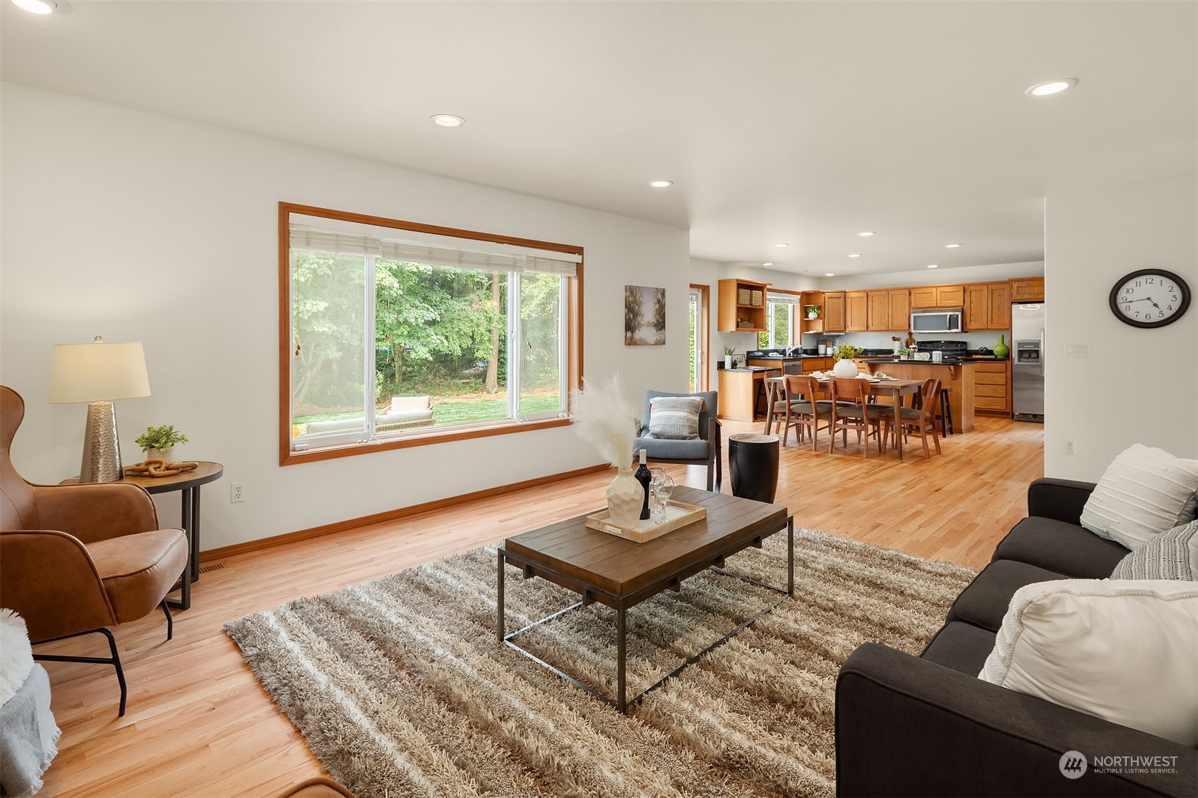 10818 27th Avenue Southeast Everett, WA 98208 - Photo 7 of 36 a living room with furniture and a large window
