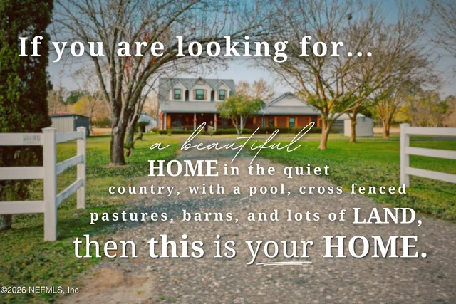a living room with furniture a fireplace and a dining table with wooden floor