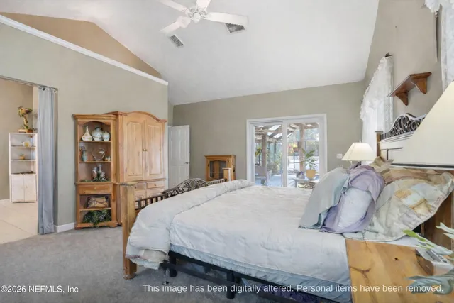 a view of a workspace with furniture and a workspace