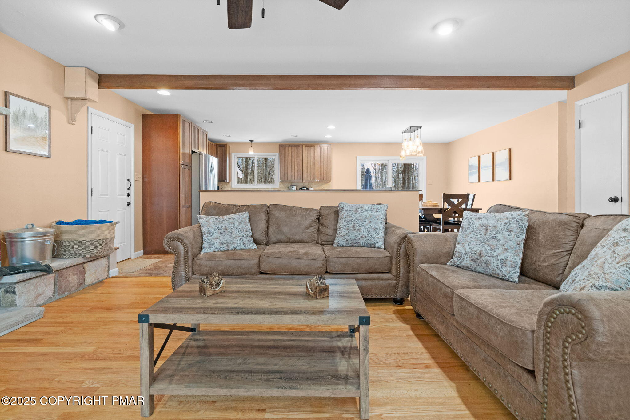 128 Winding Hill Road Pocono Pines, PA 18350 - Photo 11 of 77 a living room with furniture and a rug