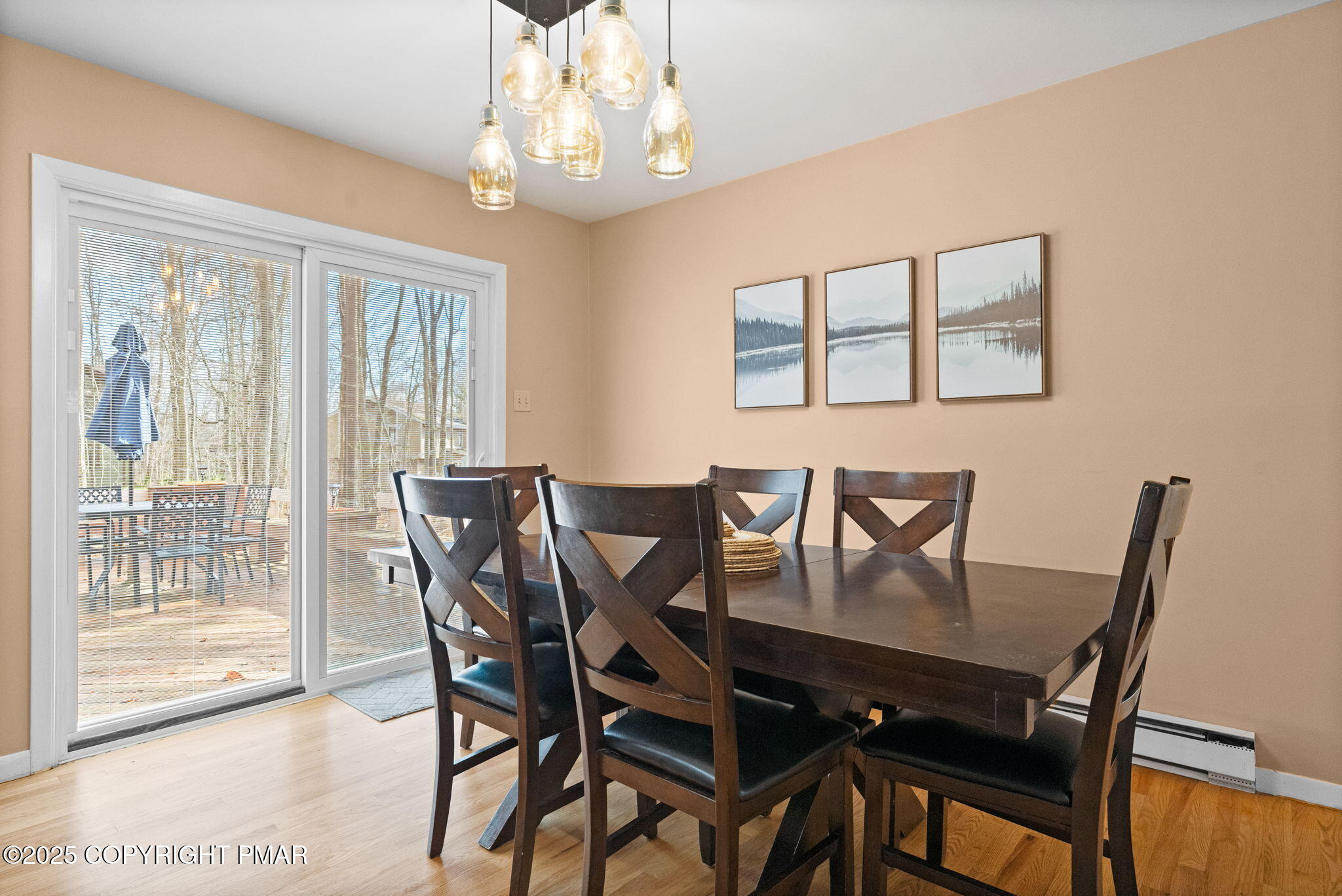 128 Winding Hill Road Pocono Pines, PA 18350 - Photo 19 of 77 a view of a dining room with furniture wooden floor and chandelier