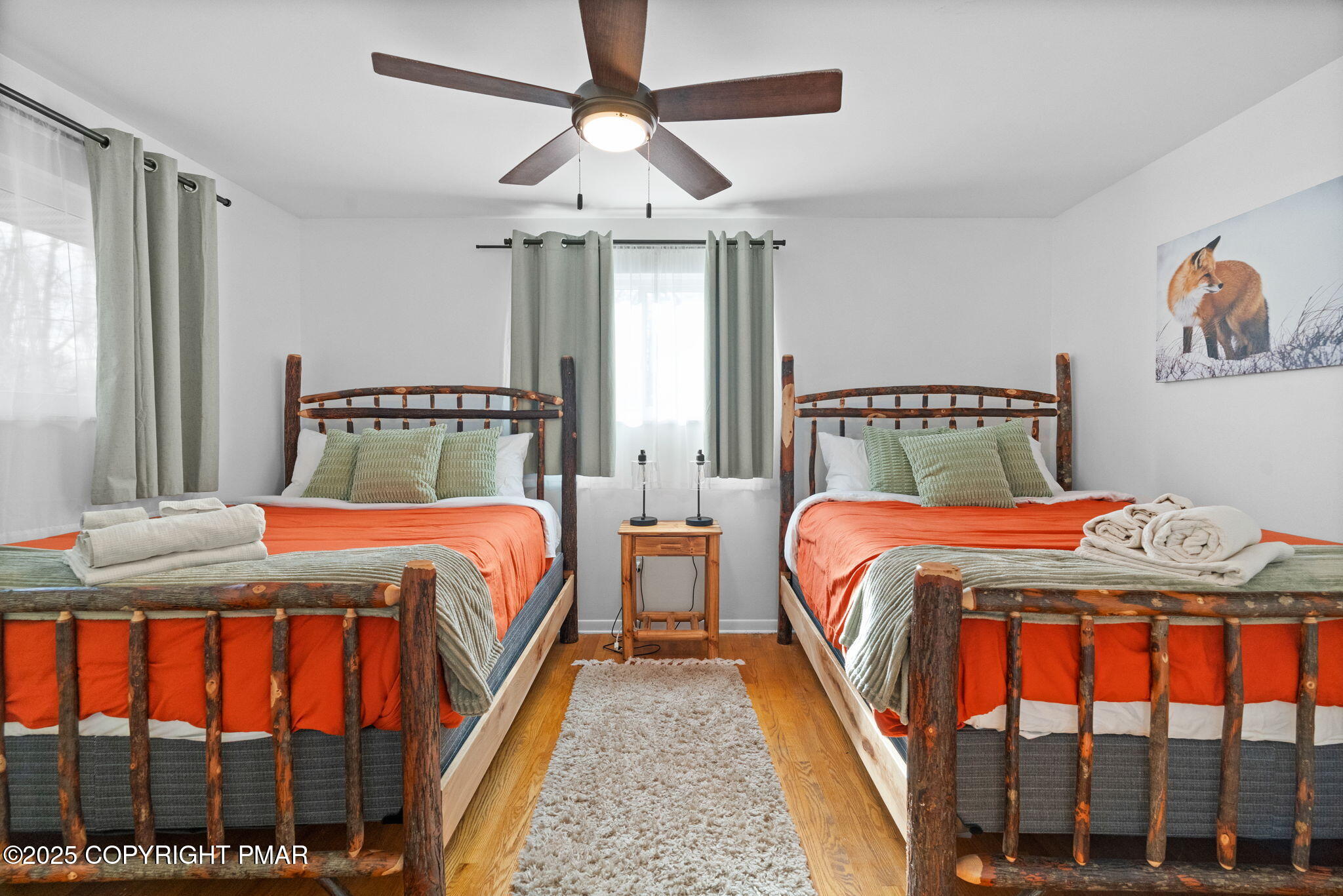 128 Winding Hill Road Pocono Pines, PA 18350 - Photo 31 of 77 a bedroom with double bed and a window