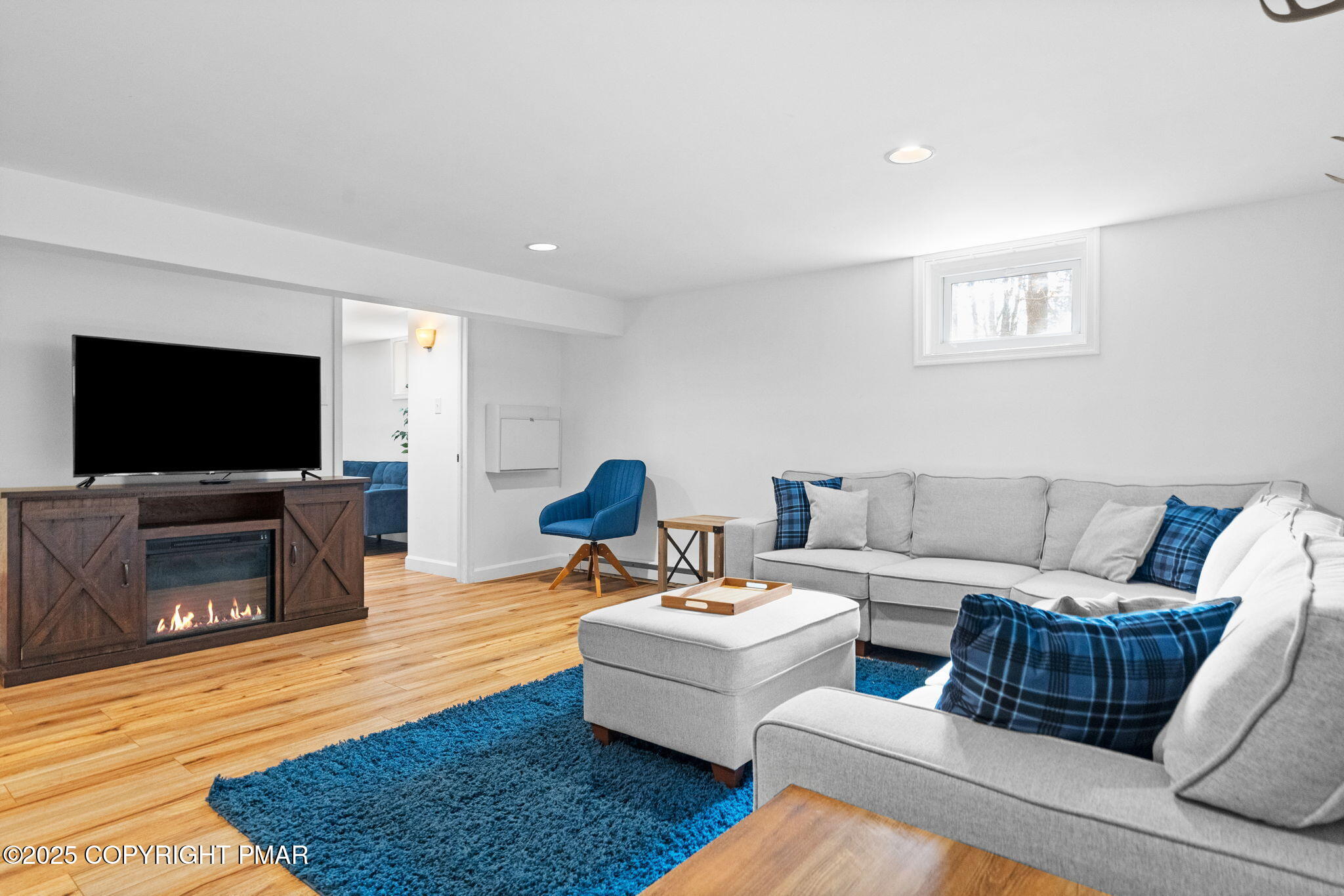 128 Winding Hill Road Pocono Pines, PA 18350 - Photo 46 of 77 a living room with furniture and a flat screen tv