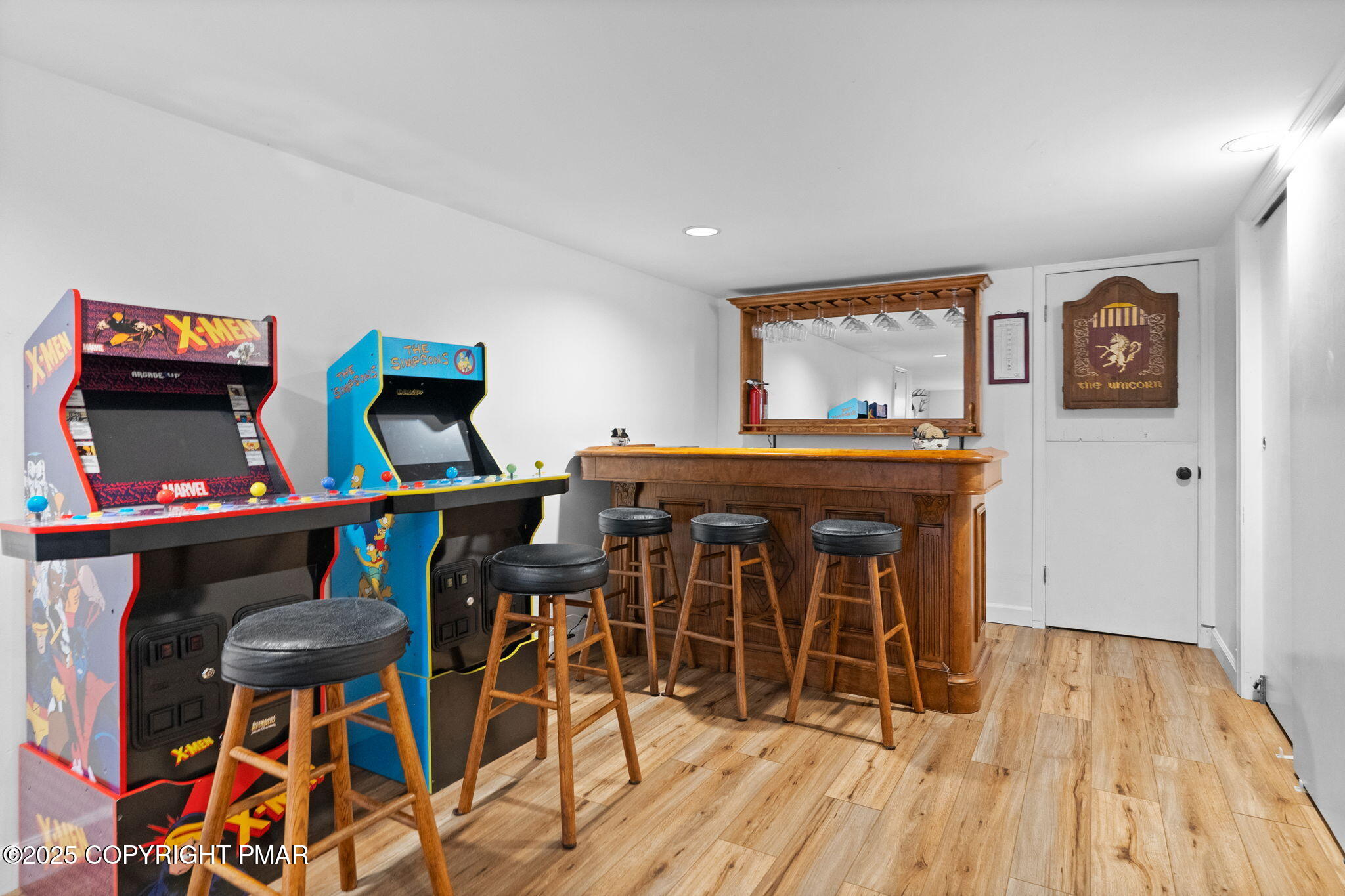 128 Winding Hill Road Pocono Pines, PA 18350 - Photo 49 of 77 a view of a dining room with furniture and wooden floor