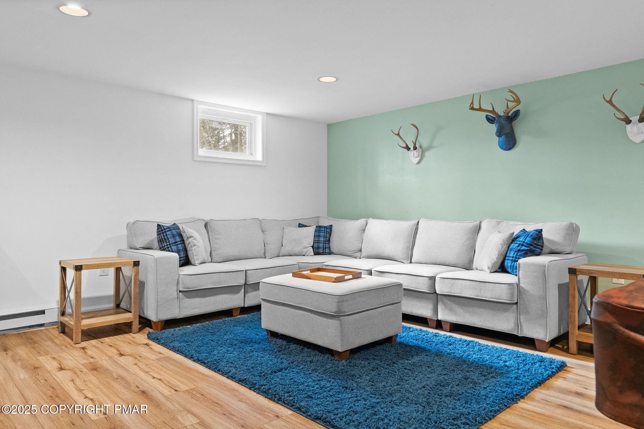 128 Winding Hill Road Pocono Pines, PA 18350 - Photo 60 of 77 a living room with furniture and a wooden floor