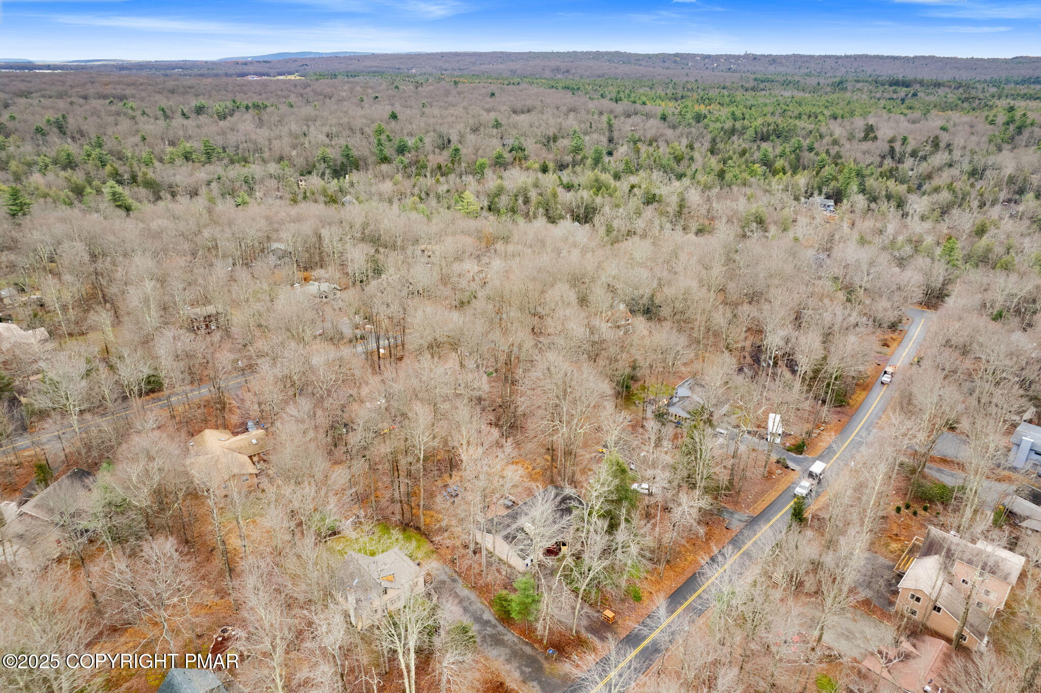 128 Winding Hill Road Pocono Pines, PA 18350 - Photo 66 of 77 a view of a field with trees in the background
