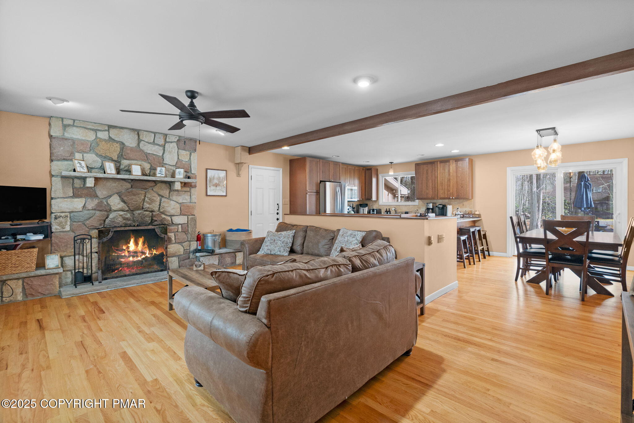 128 Winding Hill Road Pocono Pines, PA 18350 - Photo 7 of 77 a living room with furniture and a fireplace
