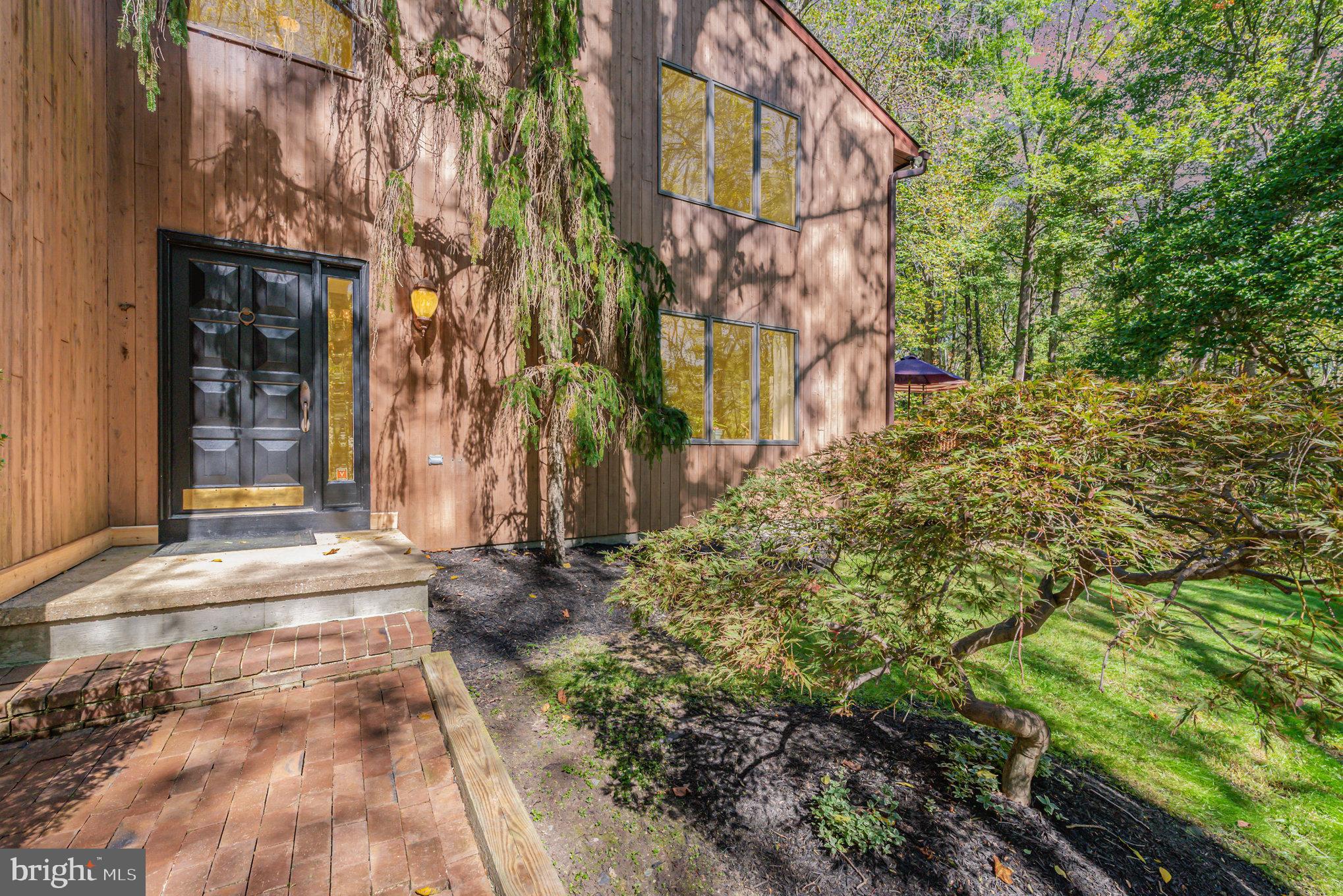 3827 Justin Road Monkton, MD 21111 - Photo 1 of 51 a backyard of a building with trees