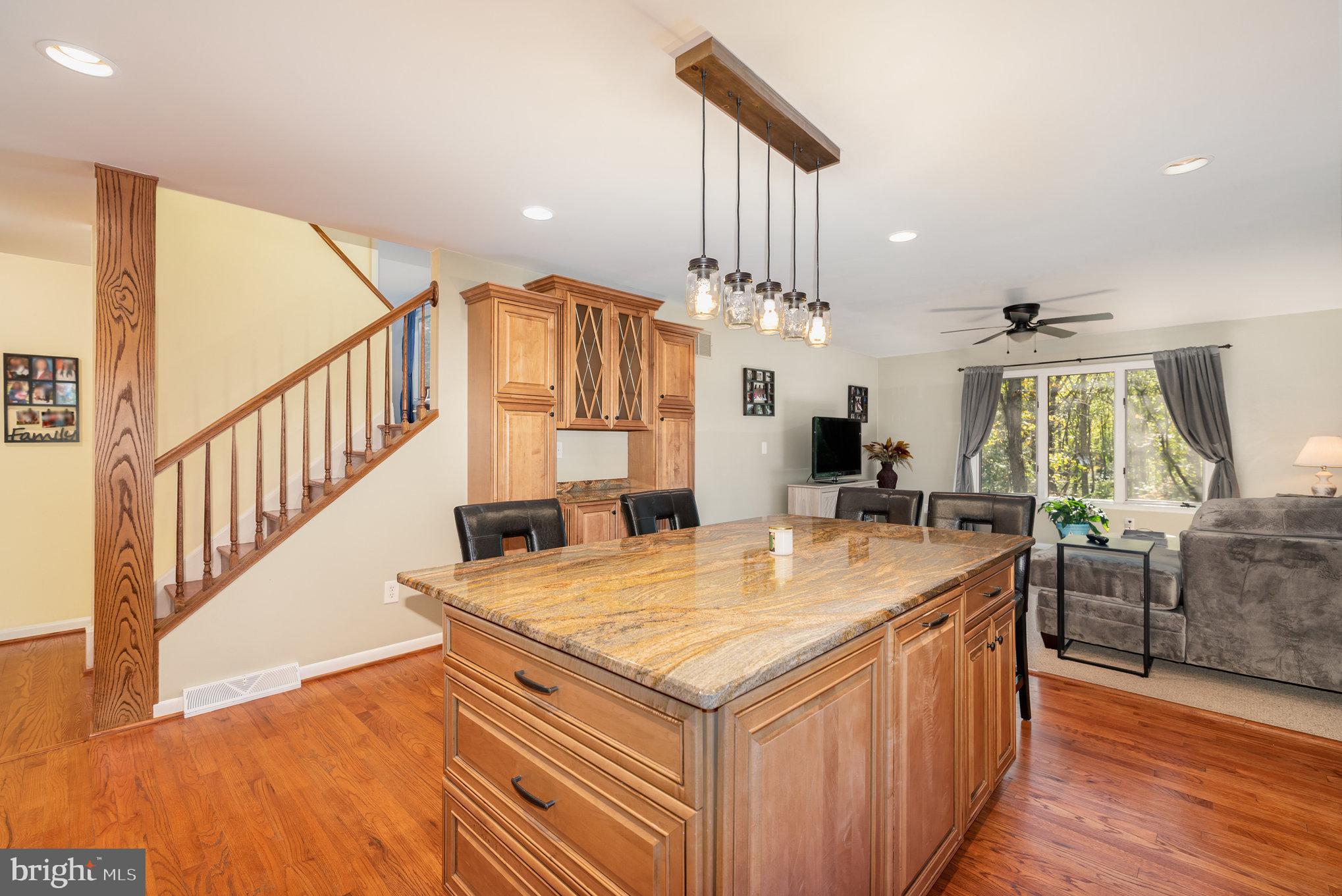 3827 Justin Road Monkton, MD 21111 - Photo 15 of 51 a room with counter top space and wooden floor