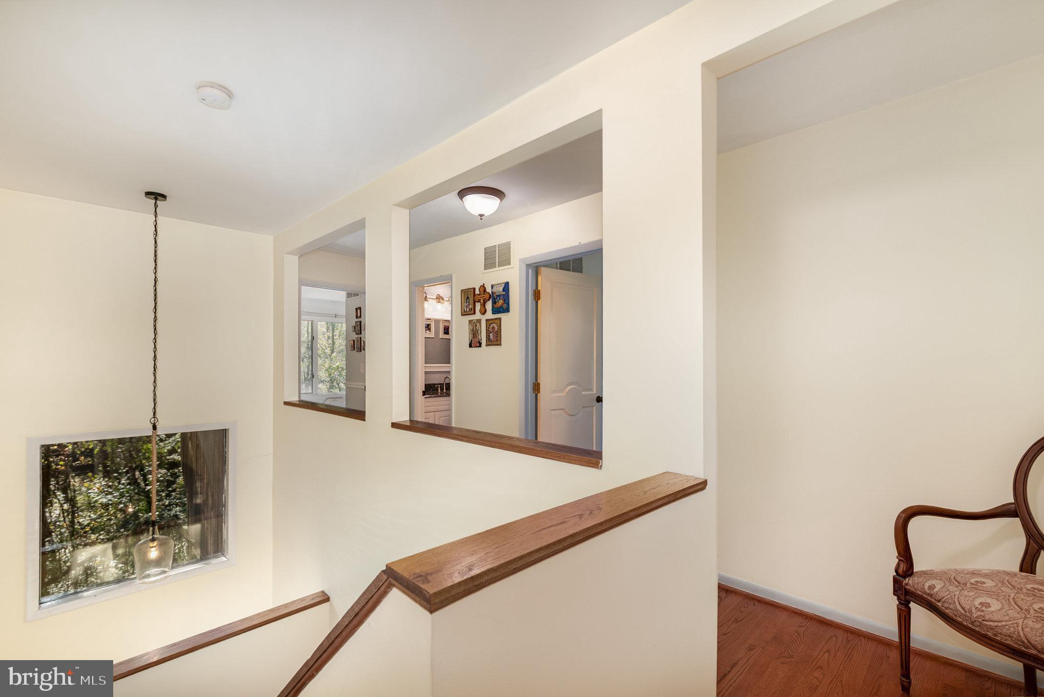 3827 Justin Road Monkton, MD 21111 - Photo 17 of 51 a view of a hallway with furniture and front door