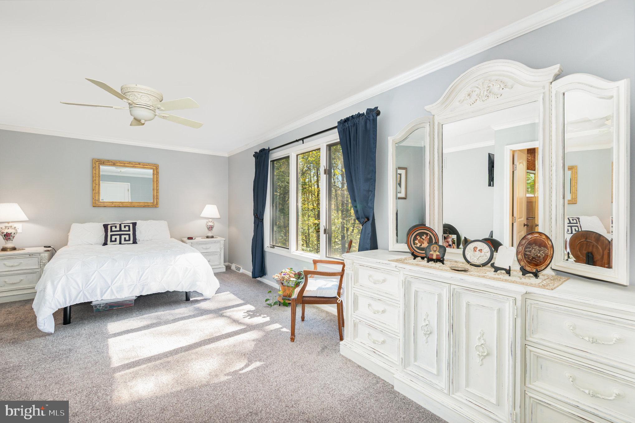 3827 Justin Road Monkton, MD 21111 - Photo 20 of 51 a bedroom with furniture and a large window