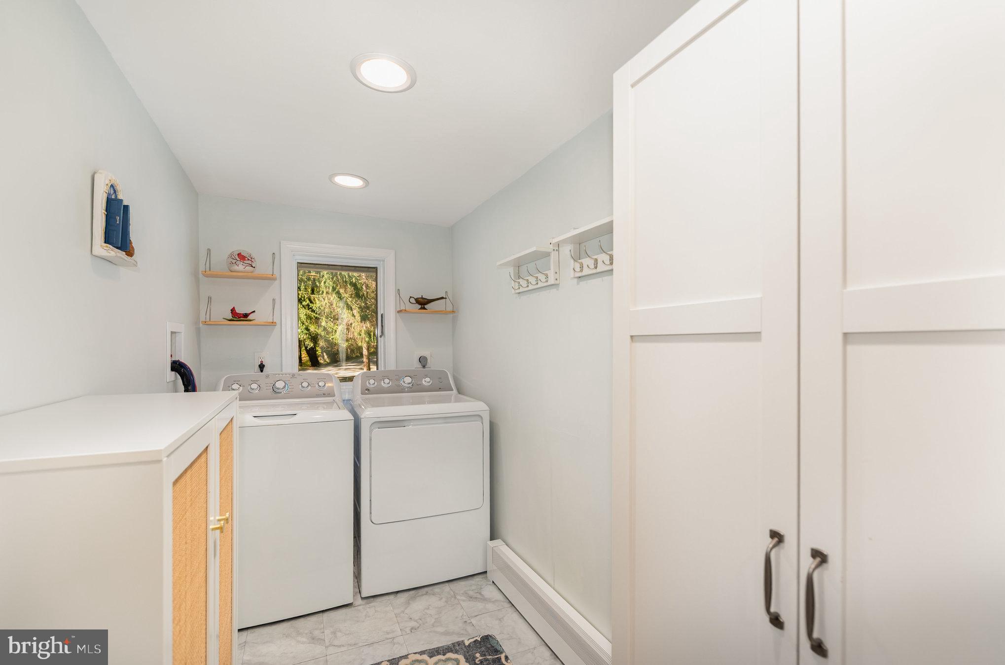 3827 Justin Road Monkton, MD 21111 - Photo 30 of 51 a view of washer and dryer with bathroom in the background