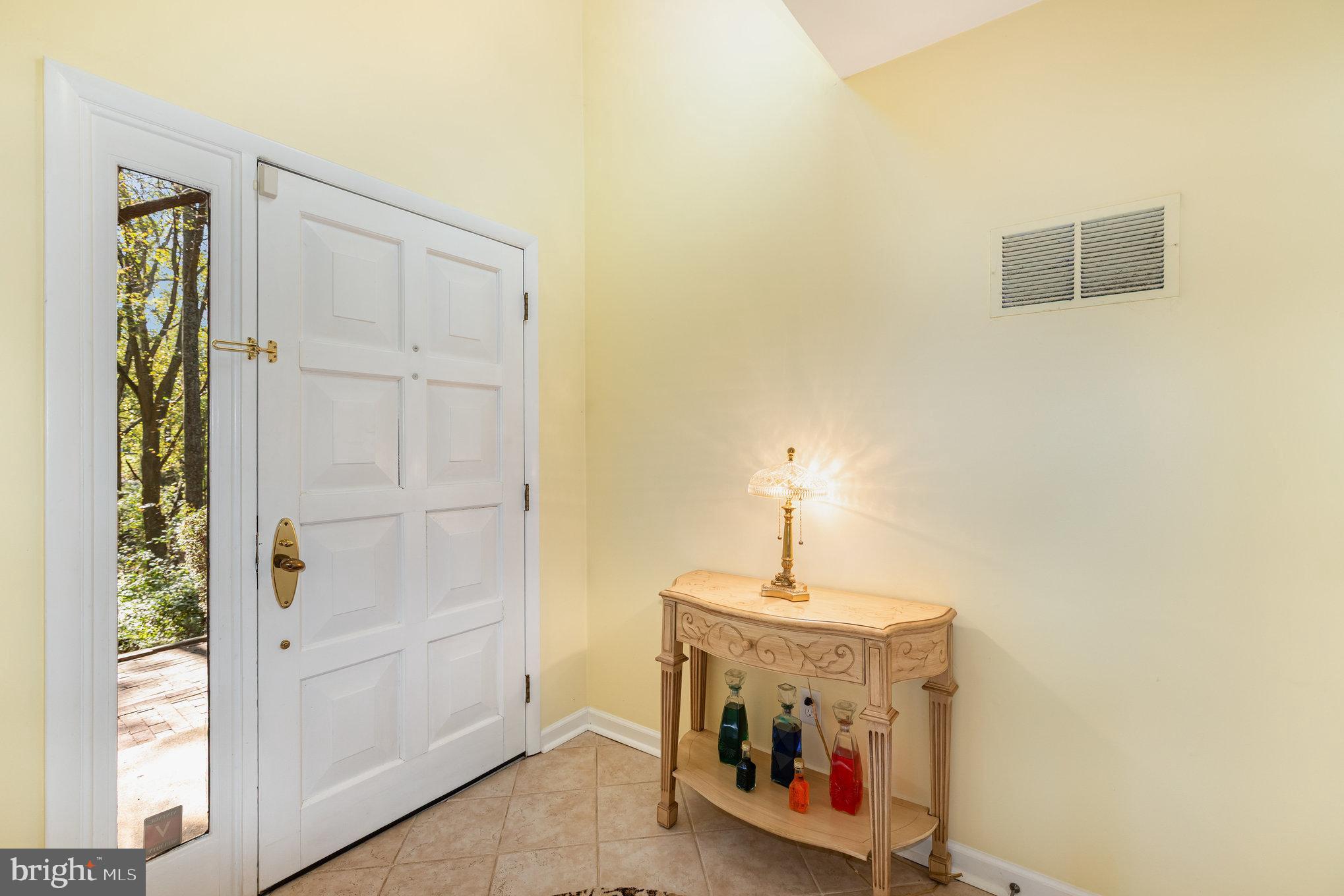 3827 Justin Road Monkton, MD 21111 - Photo 3 of 51 a view of a hallway with washer and dryer