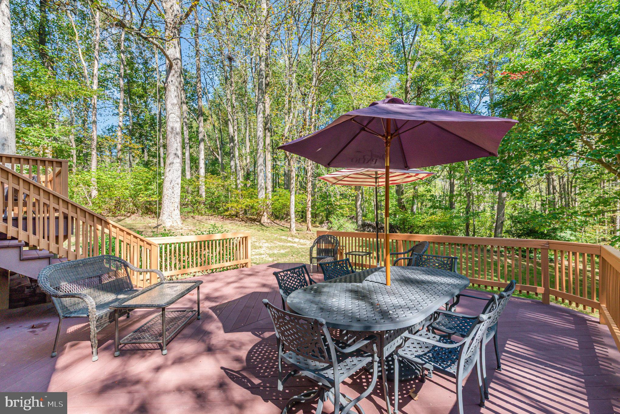 3827 Justin Road Monkton, MD 21111 - Photo 34 of 51 a view of balcony with outdoor seating and wooden floor