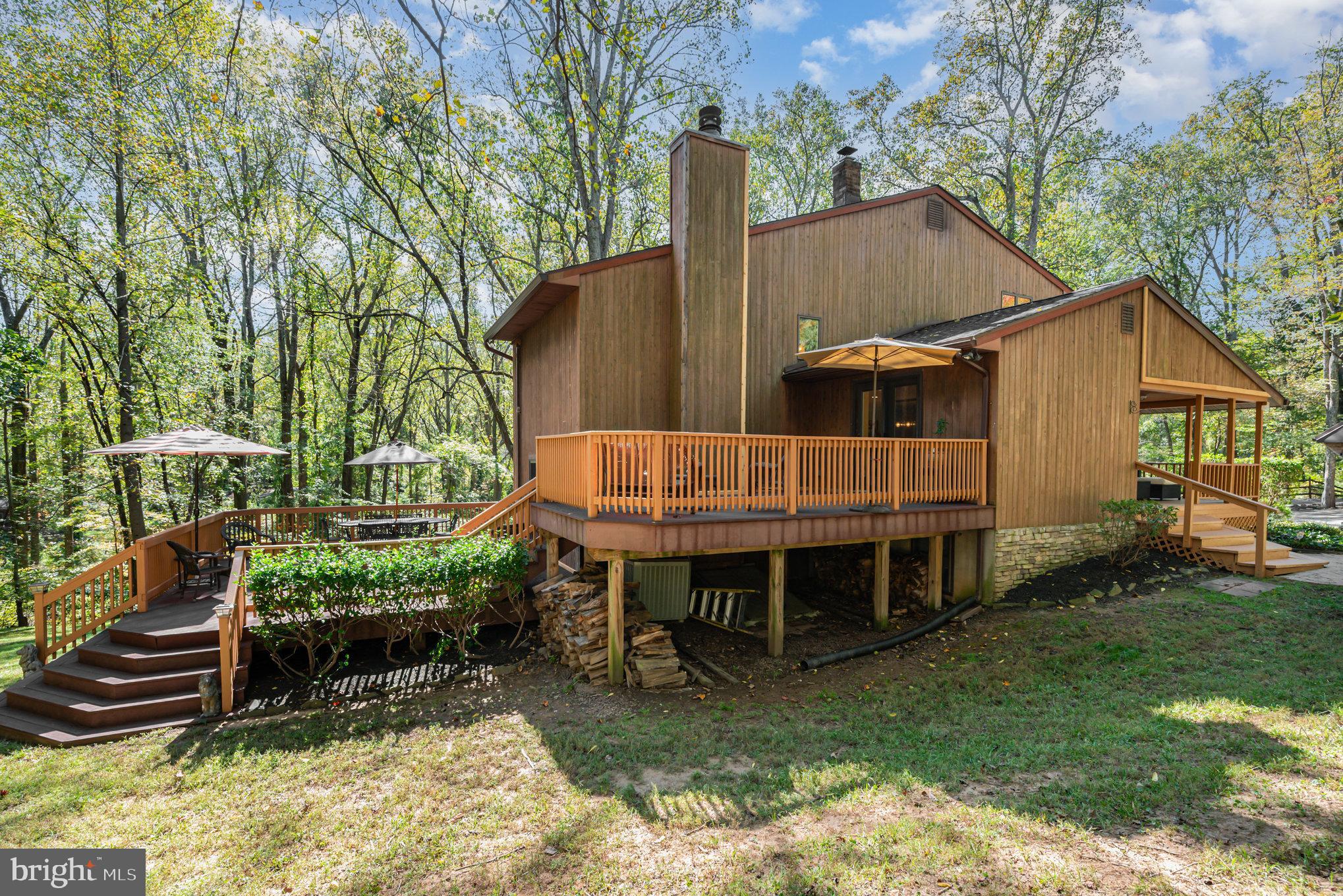 3827 Justin Road Monkton, MD 21111 - Photo 42 of 51 a view of a house with backyard and sitting area