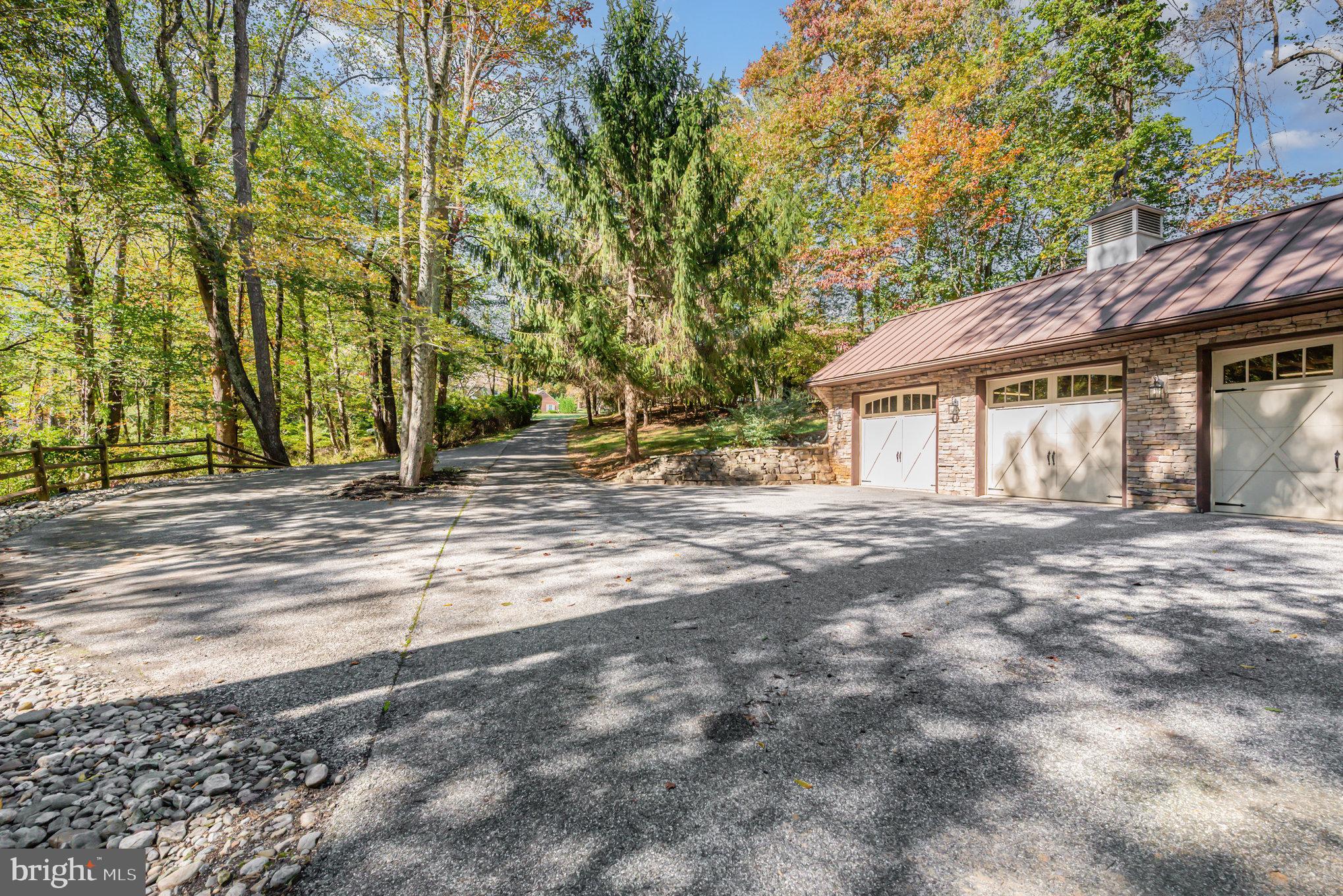 3827 Justin Road Monkton, MD 21111 - Photo 45 of 51 a view of a house with a backyard