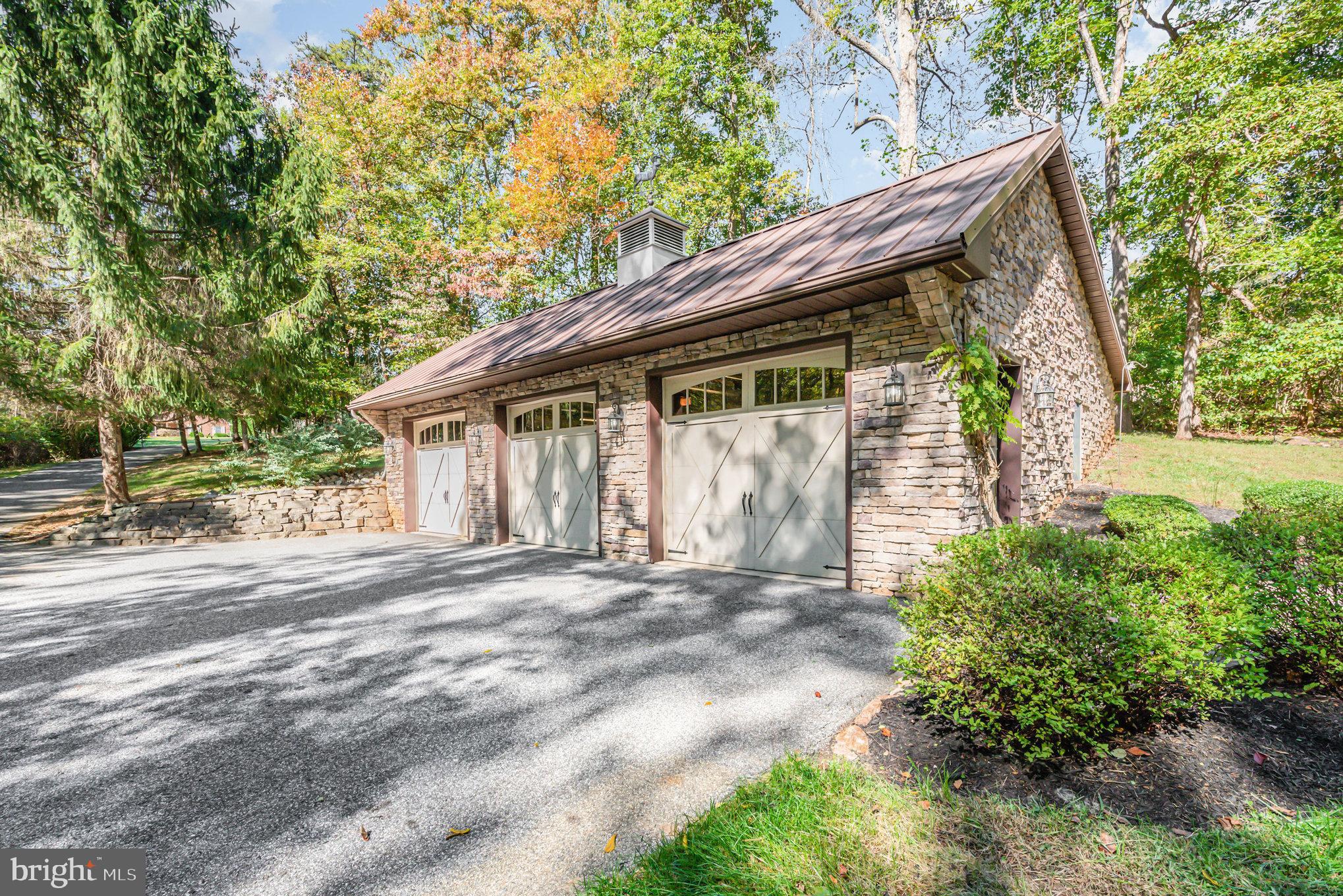 3827 Justin Road Monkton, MD 21111 - Photo 46 of 51 a front view of a house with a garden