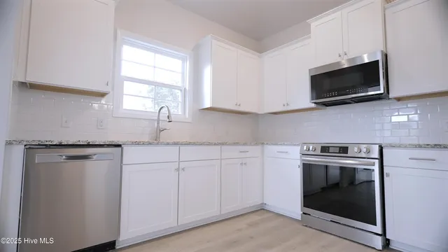 $358,900 | 1254 Opaca Drive Southeast, Bolivia, NC 28422