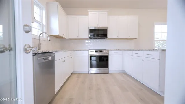 $358,900 | 1254 Opaca Drive Southeast, Bolivia, NC 28422