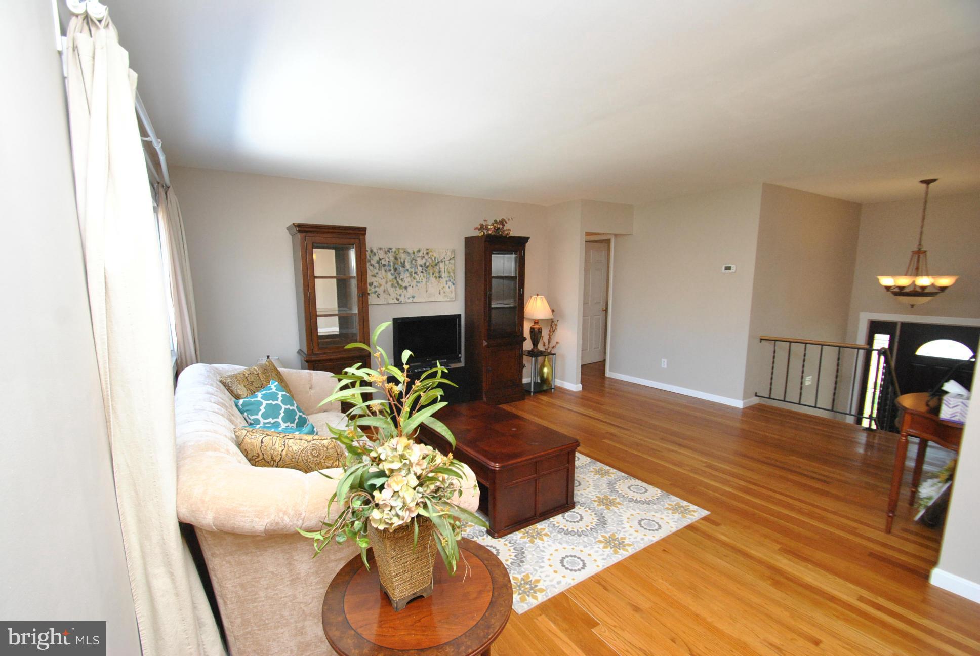 4422 Fieldgreen Road Baltimore, MD 21236 - Photo 11 of 28 FRESH NEUTRAL PAINT & GORGEOUS NATURAL HARDWOODS