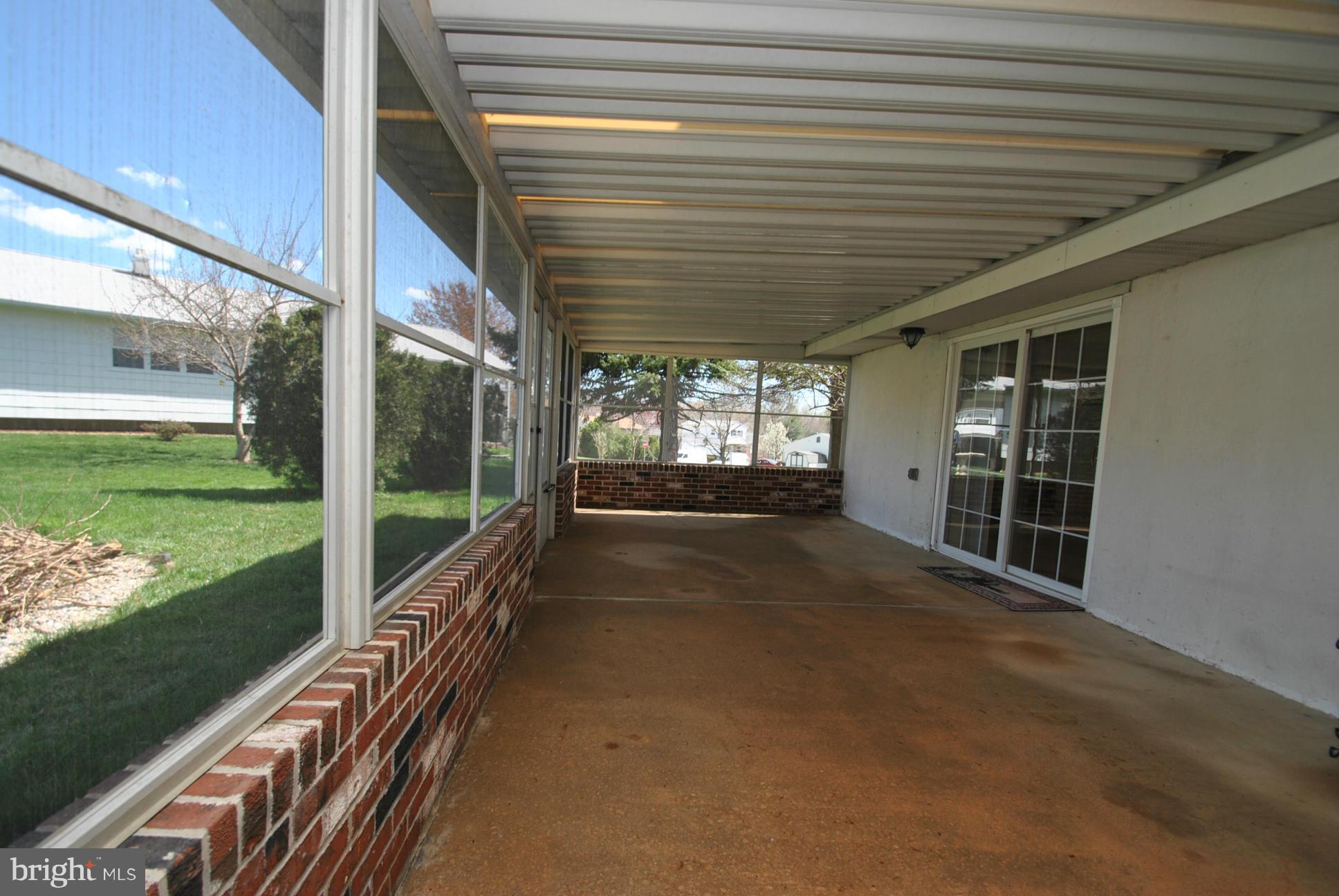 4422 Fieldgreen Road Baltimore, MD 21236 - Photo 25 of 28 ENCLOSED REAR 3 SEASON SUN PORCH