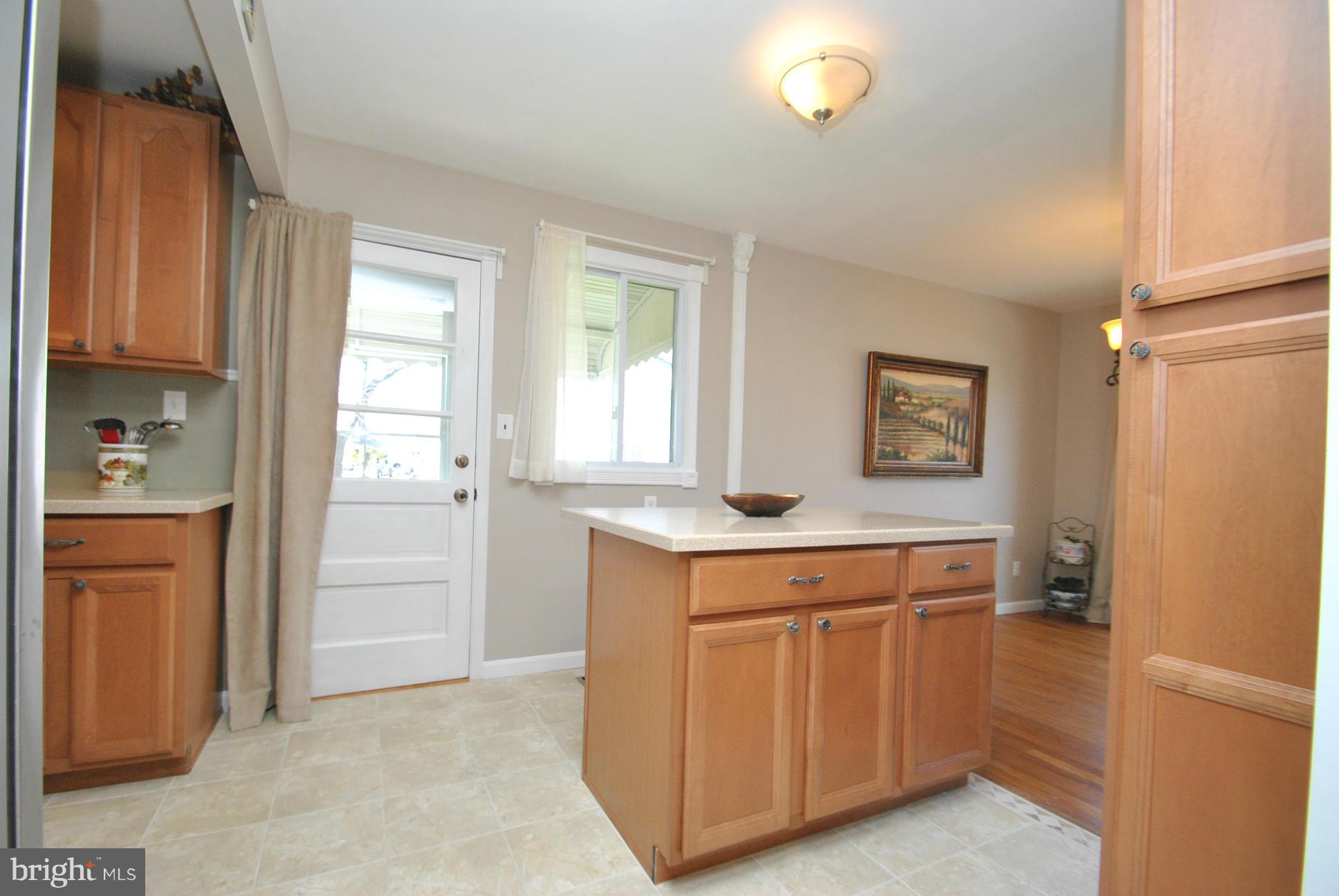 4422 Fieldgreen Road Baltimore, MD 21236 - Photo 6 of 28 CUSTOM UPDATED KITCHEN W/ISLAND & EXTRA STORAGE