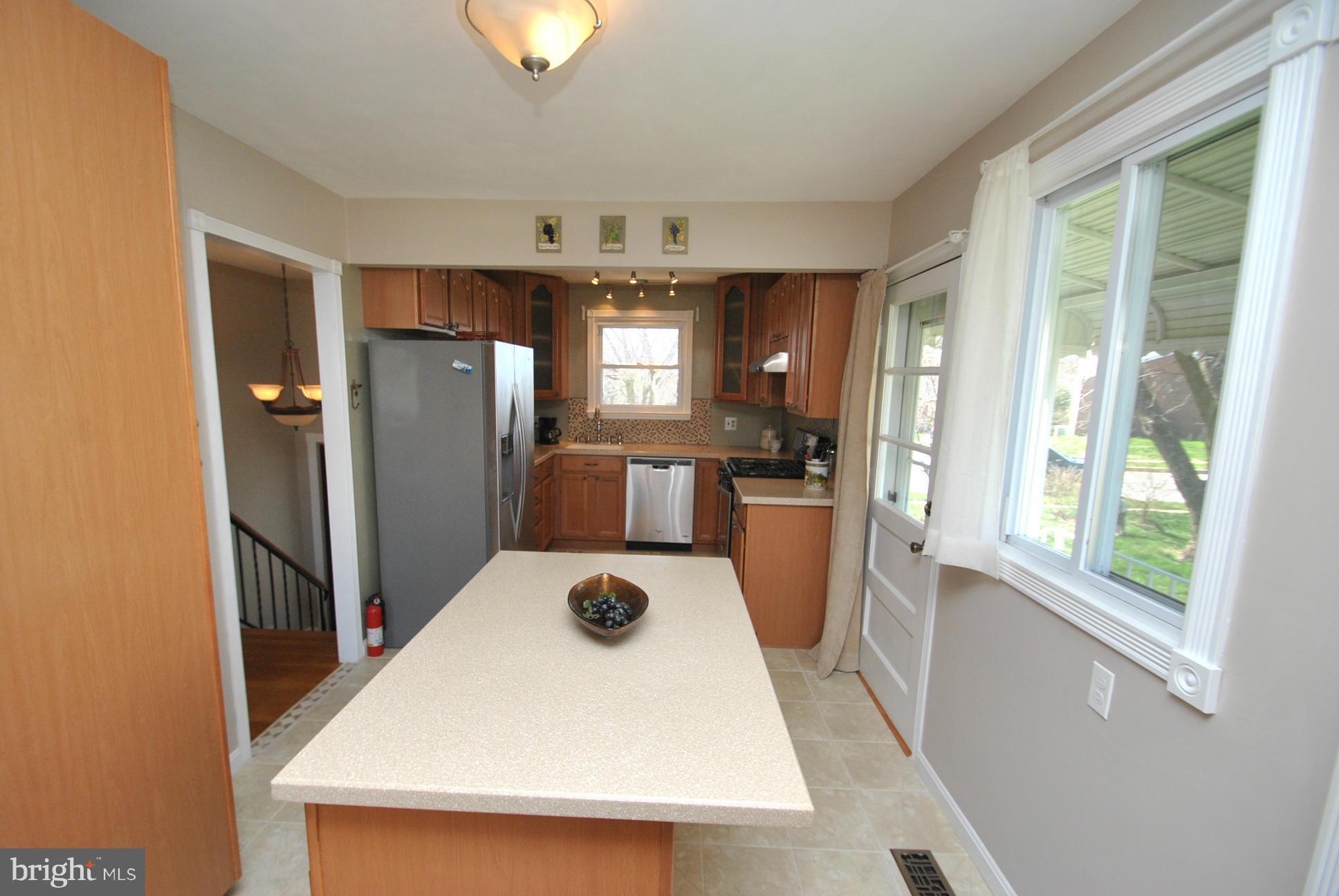 4422 Fieldgreen Road Baltimore, MD 21236 - Photo 7 of 28 CUSTOM KITCHEN W/BUILT IN ISLAND & EXTRA STORAGE
