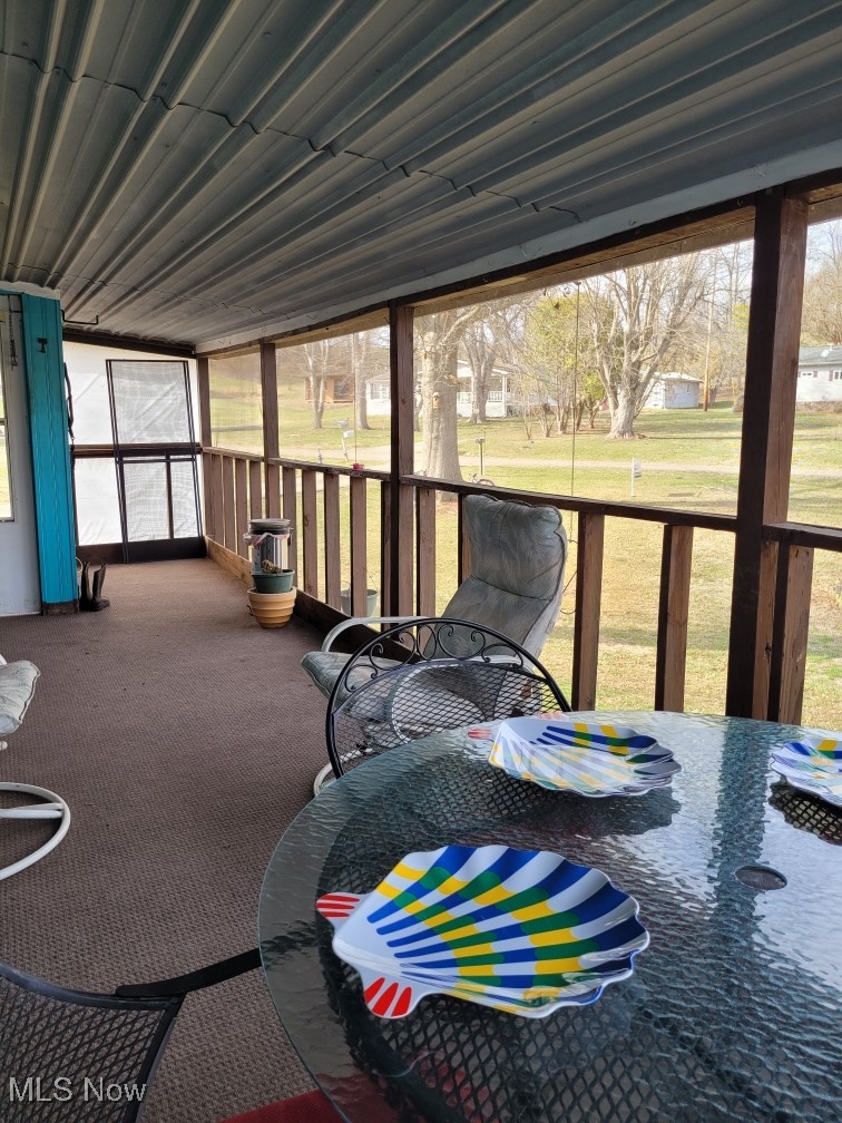 57894 Flamingo Road Senecaville, OH 43780 - Photo 19 of 20 Sunroom / solarium featuring outdoor dining area and a wealth of natural light