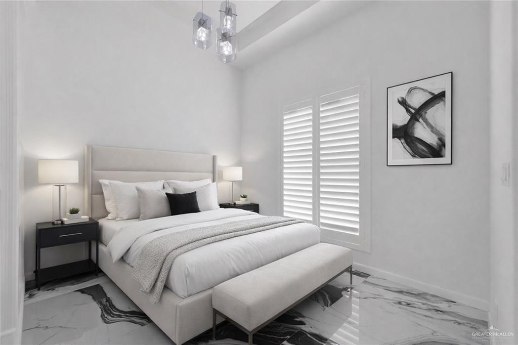 1315 Thompson Road Mission, TX 78573 - Photo 11 of 38 Bedroom with light marble finish floors and a high ceiling