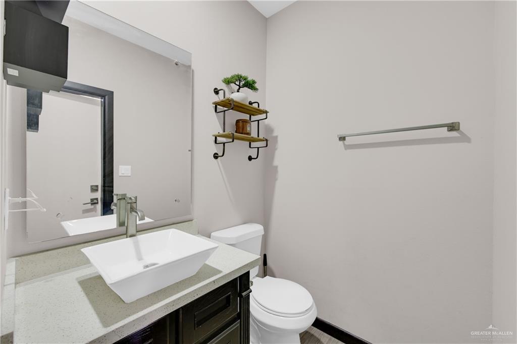 1315 Thompson Road Mission, TX 78573 - Photo 28 of 38 Bathroom with vanity and toilet