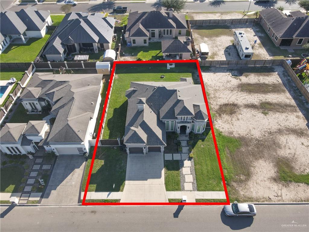 1315 Thompson Road Mission, TX 78573 - Photo 30 of 38 Aerial perspective of suburban area featuring property parcel outlined