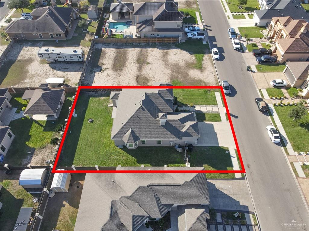 1315 Thompson Road Mission, TX 78573 - Photo 32 of 38 Aerial perspective of suburban area with property boundaries highlighted