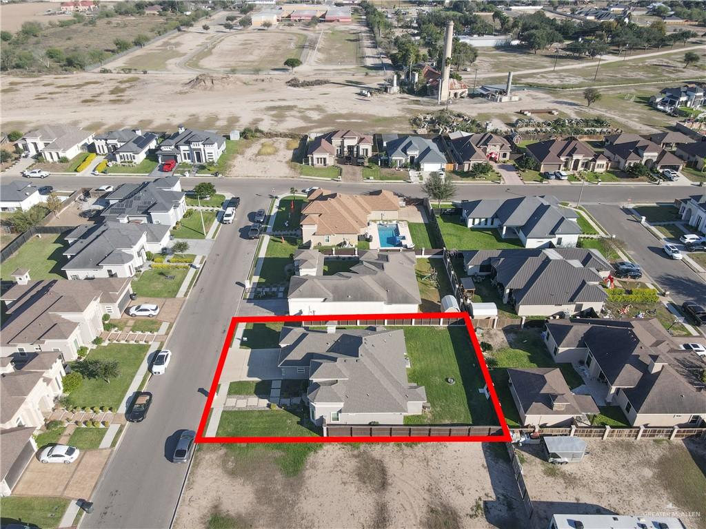 1315 Thompson Road Mission, TX 78573 - Photo 35 of 38 Aerial view of property and surrounding area with nearby suburban area and property parcel outlined
