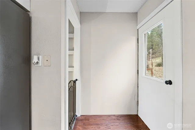 a view of front door with hallway