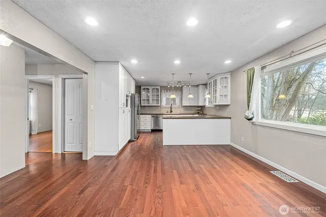 a view of kitchen with wooden floor