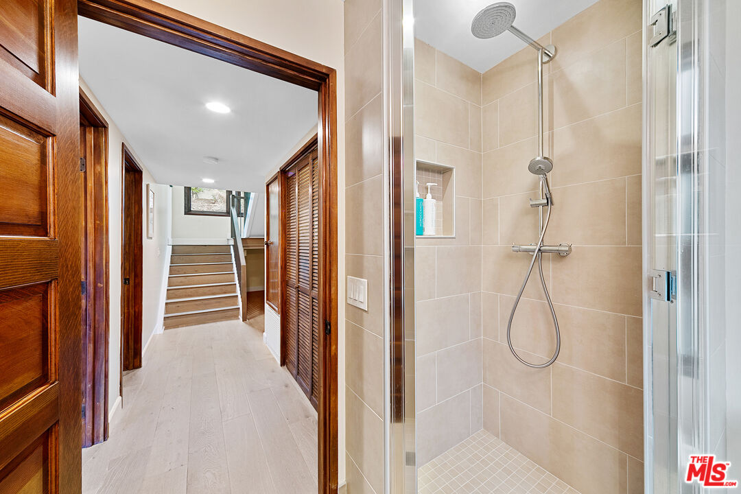 25659 Aline Way Calabasas, CA 91302 - Photo 36 of 53 a view of a bathroom with a shower