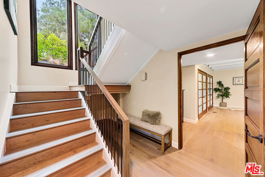 25659 Aline Way Calabasas, CA 91302 - Photo 37 of 53 a view of entryway and hall with wooden floor