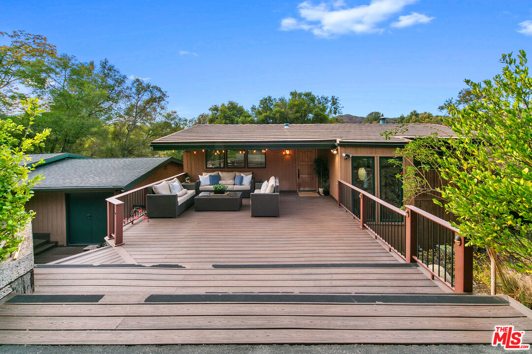 25659 Aline Way Calabasas, CA 91302 - Photo 5 of 53 a view of a patio with chairs and a table