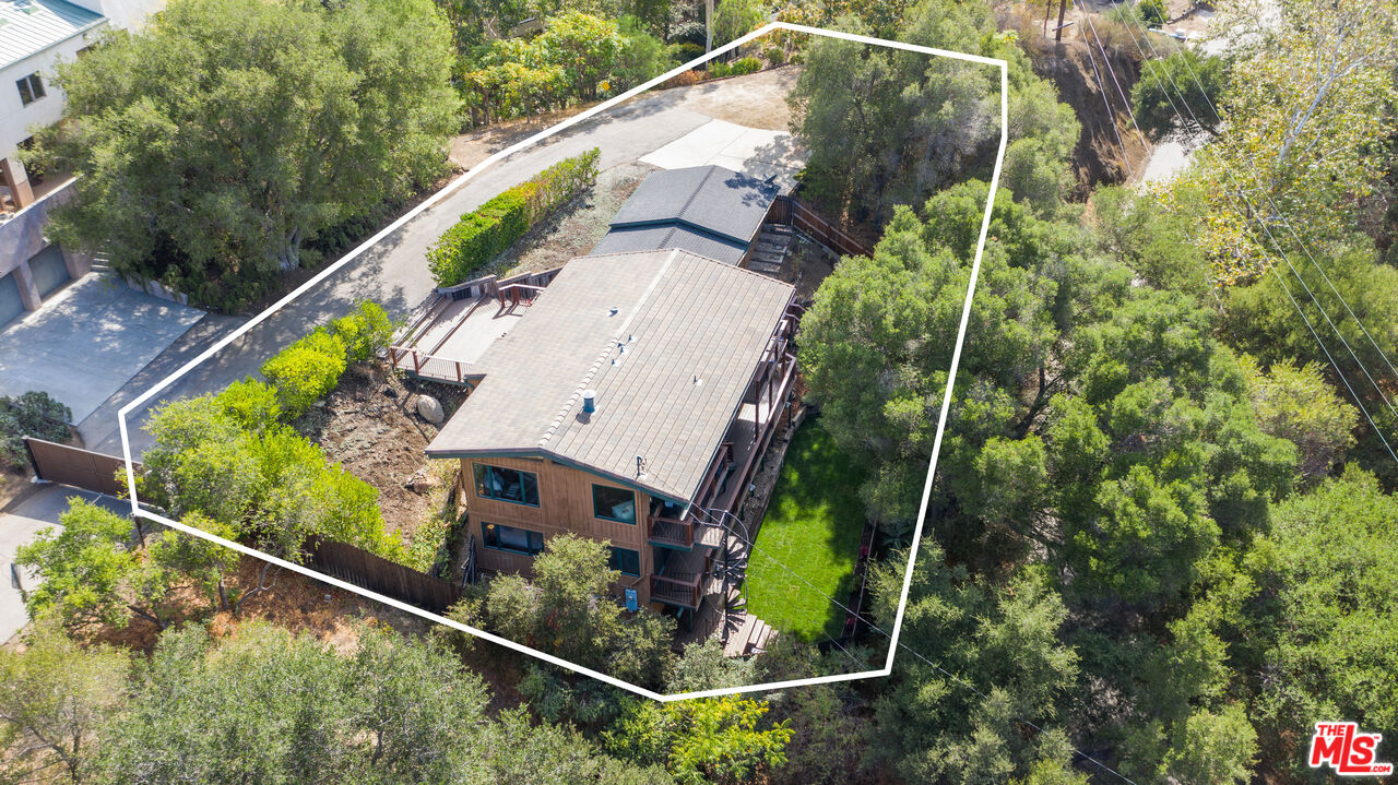 25659 Aline Way Calabasas, CA 91302 - Photo 49 of 53 an aerial view of a house with a yard