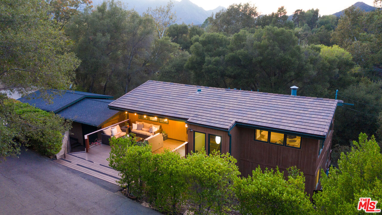 25659 Aline Way Calabasas, CA 91302 - Photo 50 of 53 a backyard of a house with a yard and outdoor seating