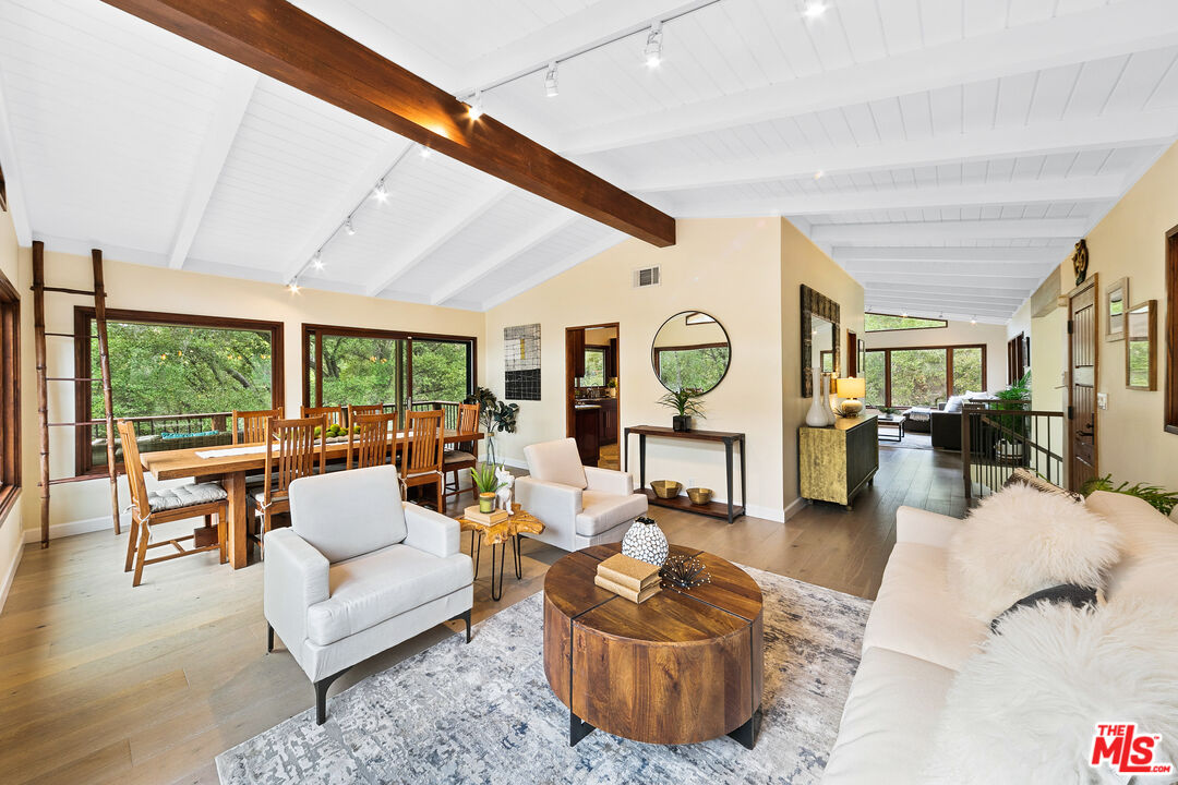25659 Aline Way Calabasas, CA 91302 - Photo 10 of 53 a living room with furniture and a large window