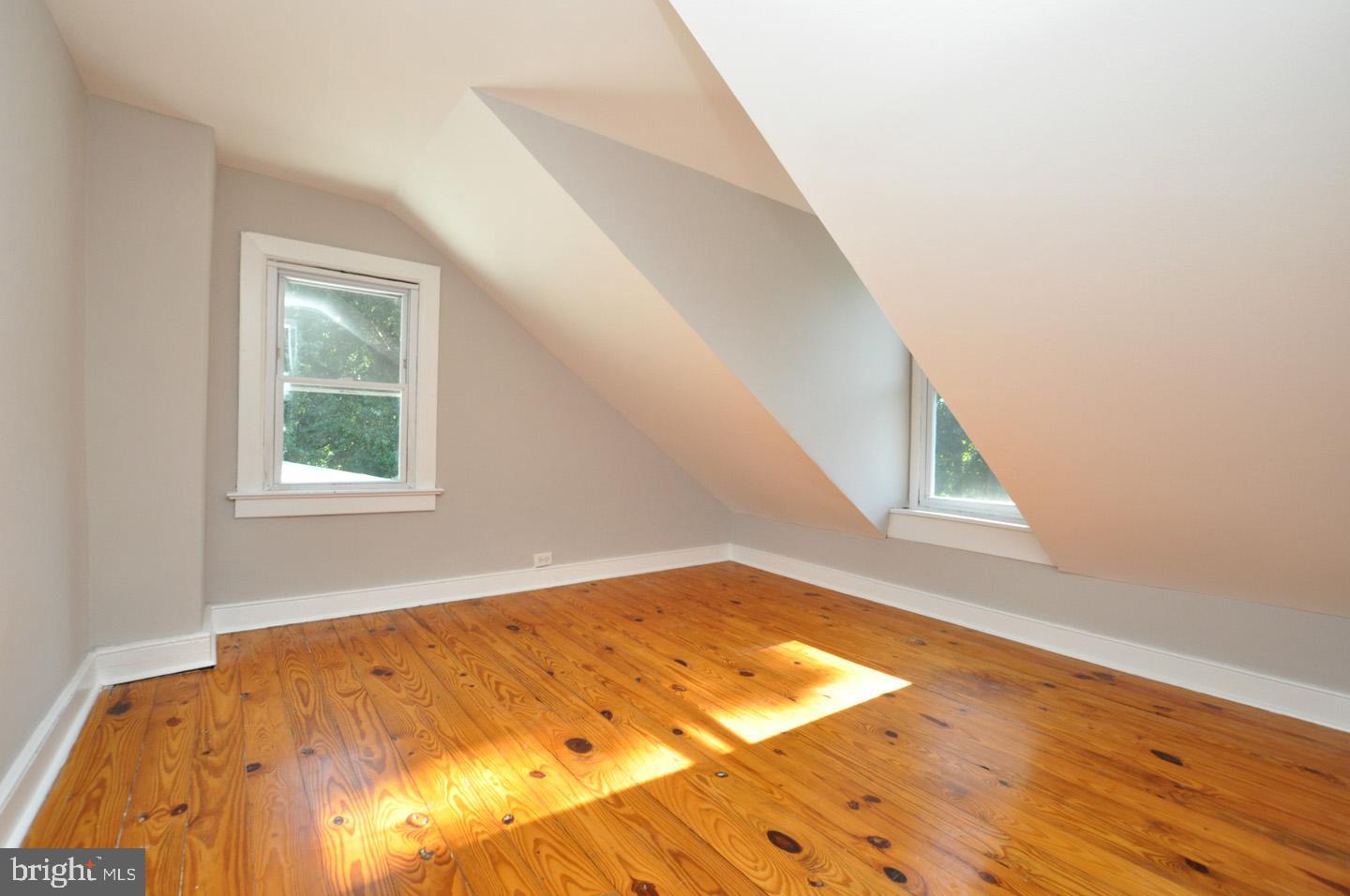 20 New Albany Road Moorestown, NJ 08057 - Photo 22 of 25 a view of a bedroom with wooden floor and windows