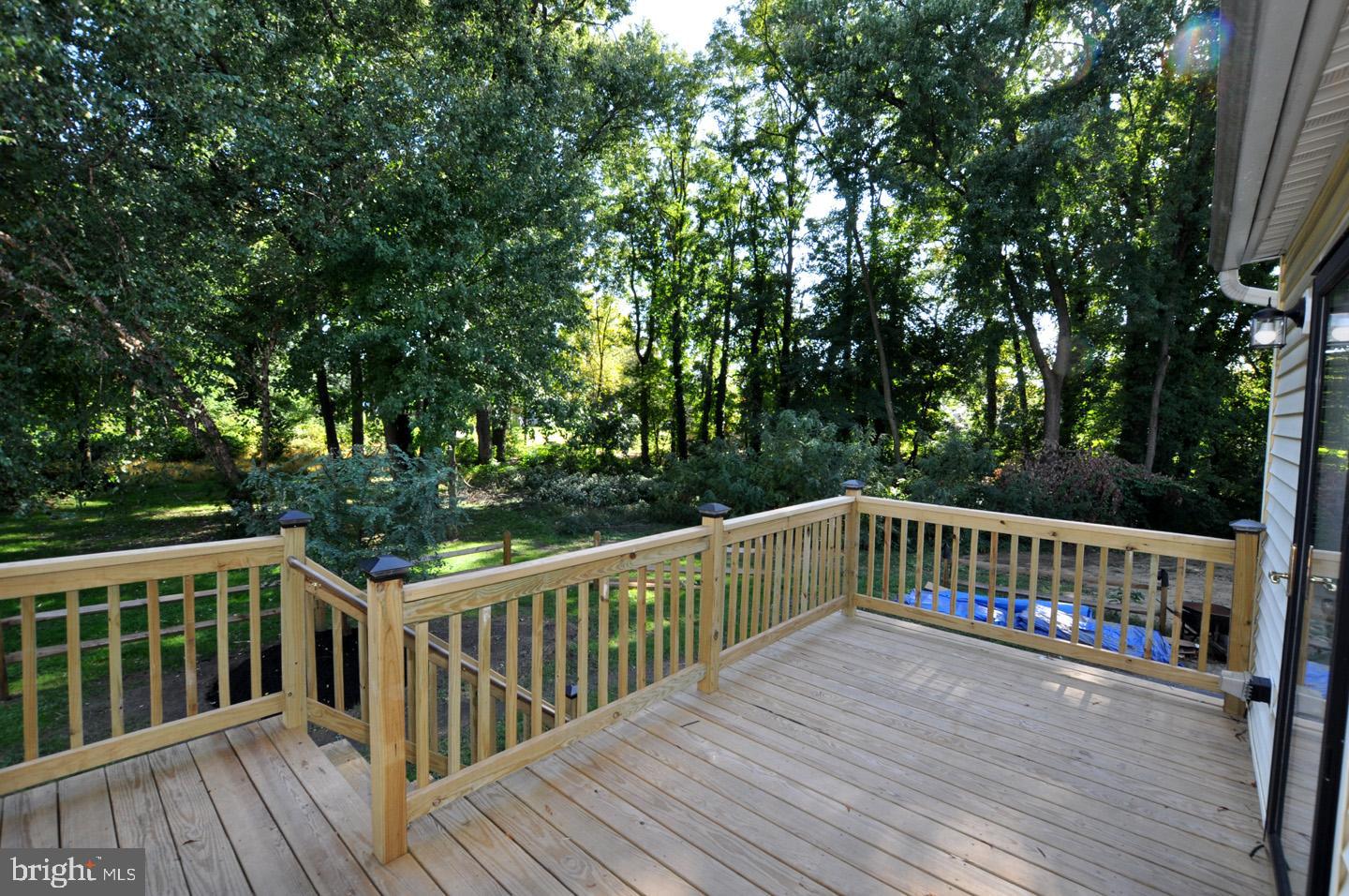 20 New Albany Road Moorestown, NJ 08057 - Photo 23 of 25 a view of deck with seating and trees