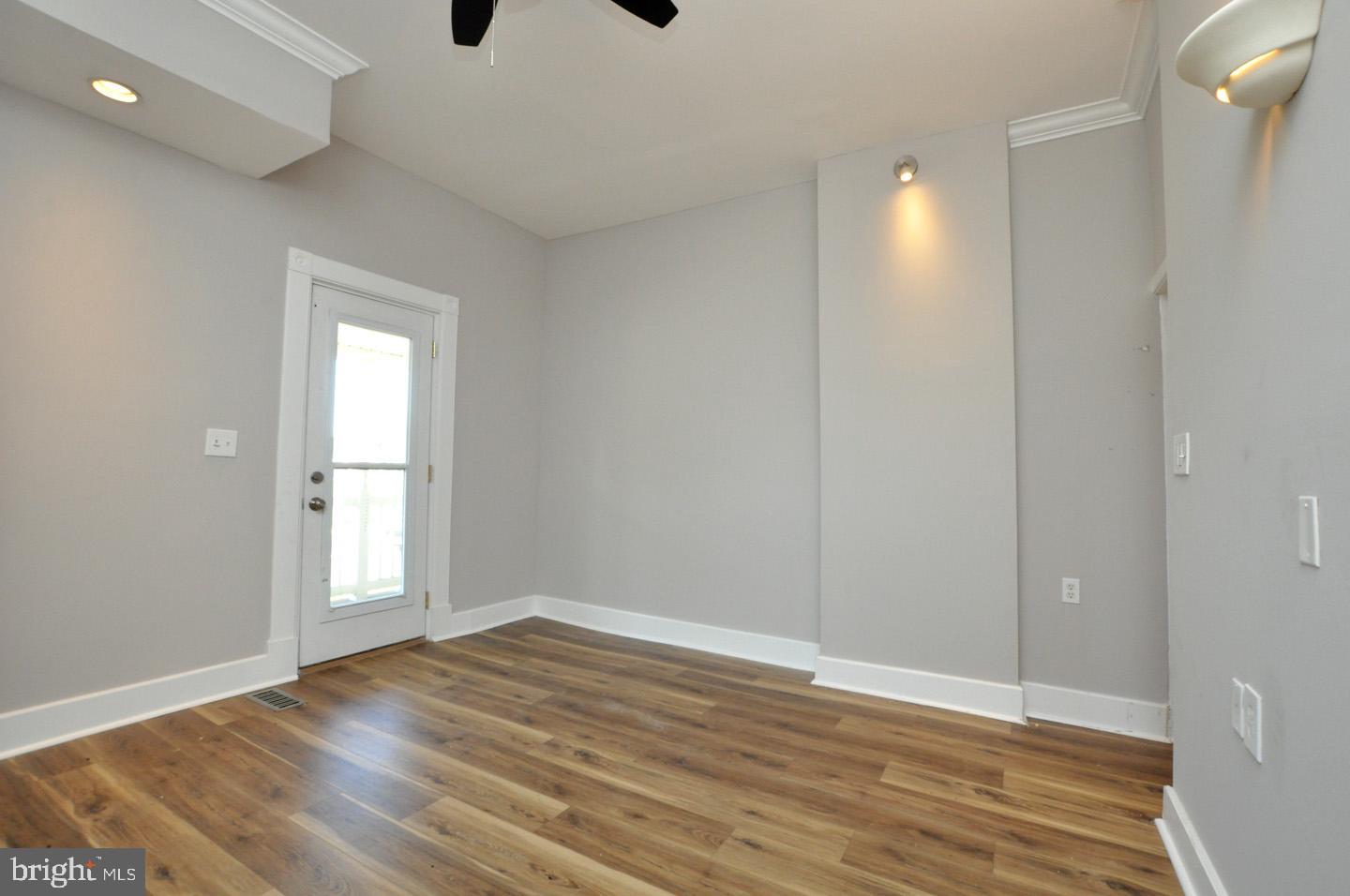 20 New Albany Road Moorestown, NJ 08057 - Photo 6 of 25 wooden floor in an empty room with a window