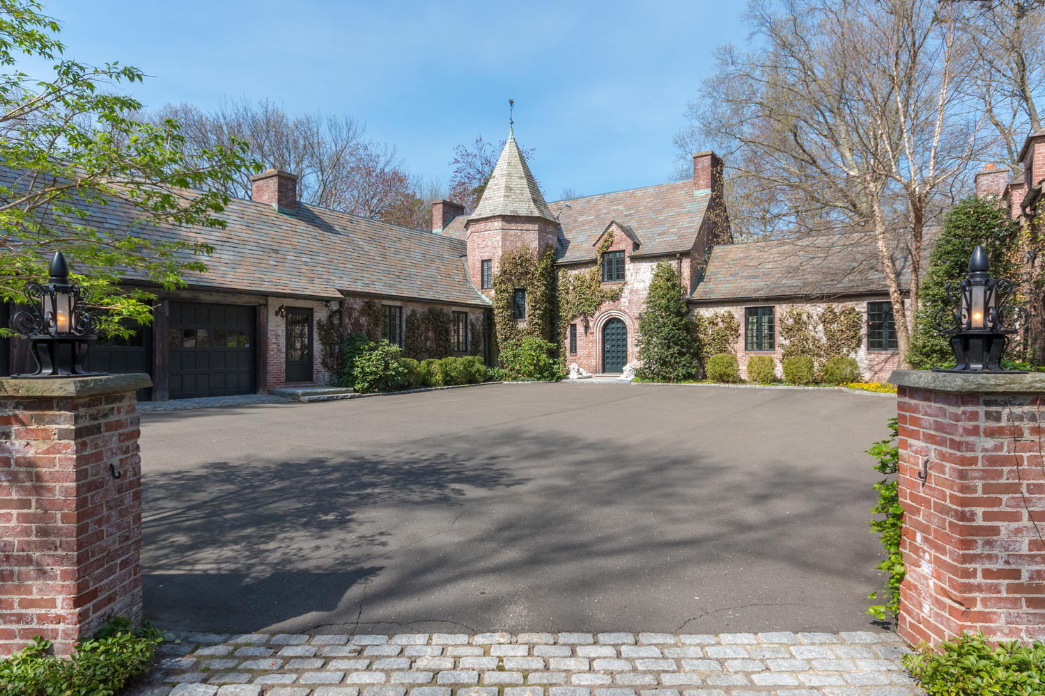 170 Ridge Acres Road Darien, CT 06820 - Photo 1 of 50 a front view of a house with a yard