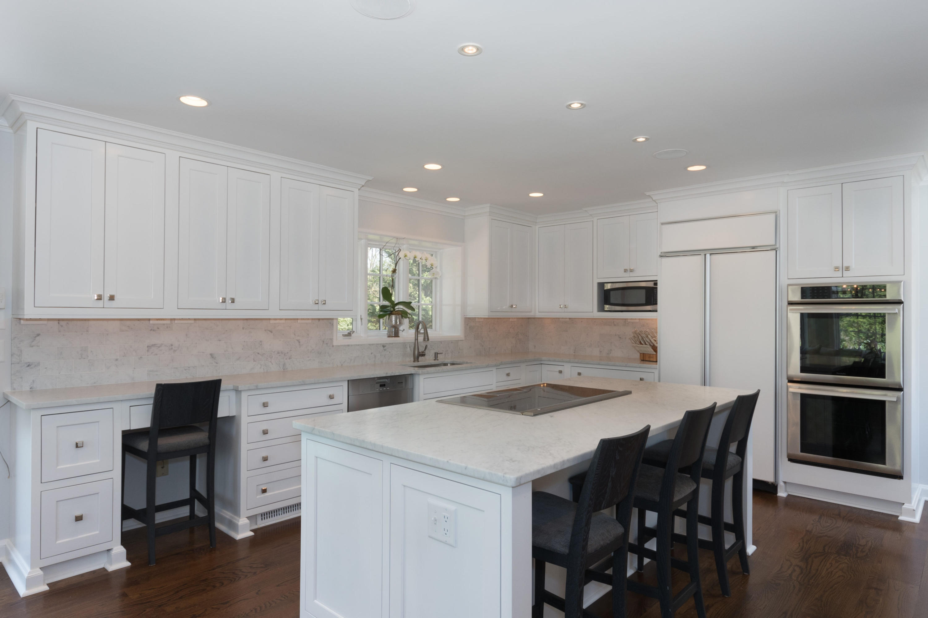 170 Ridge Acres Road Darien, CT 06820 - Photo 13 of 50 a kitchen with white cabinets and stainless steel appliances