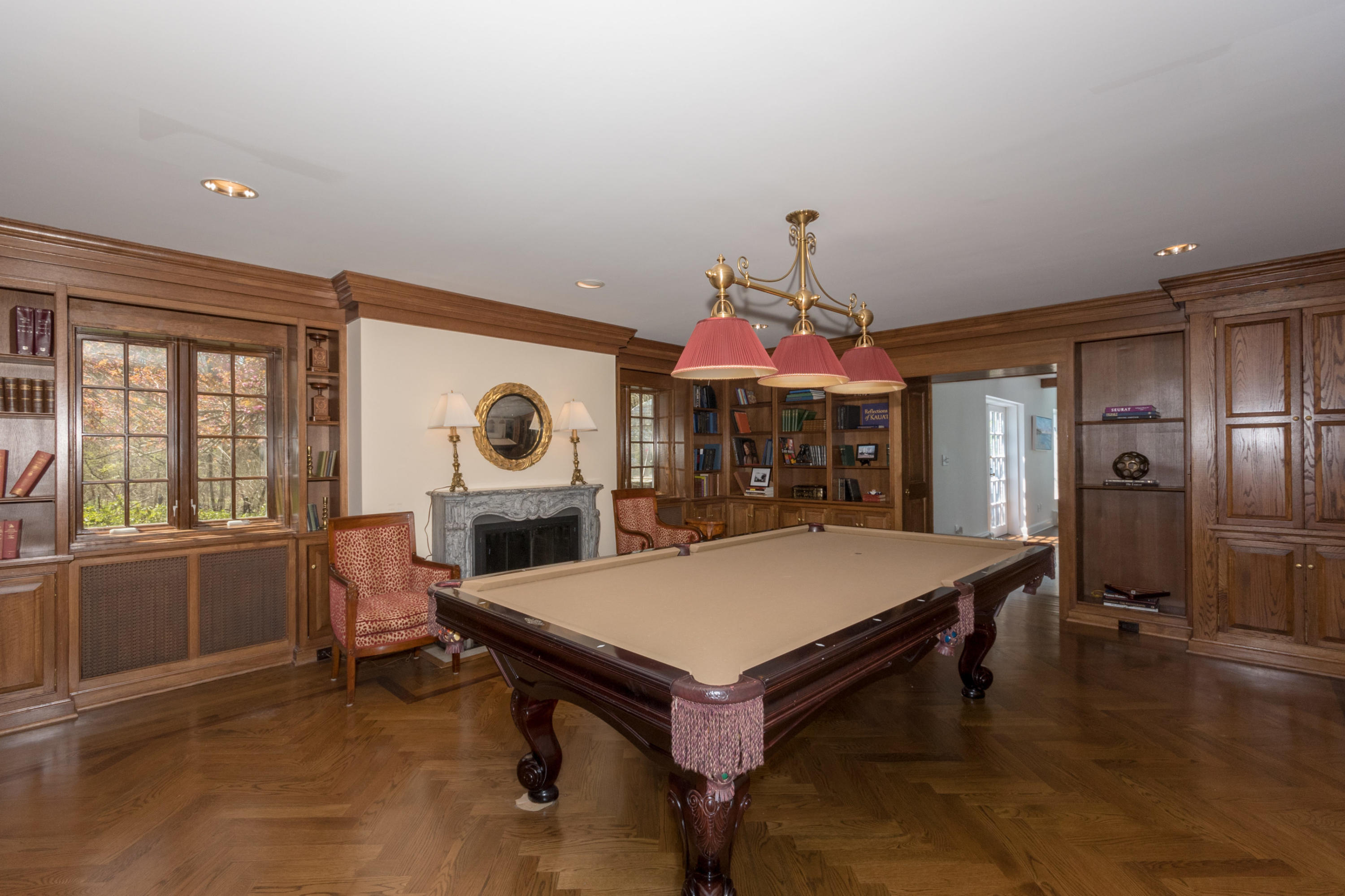 170 Ridge Acres Road Darien, CT 06820 - Photo 16 of 50 a view of a dining room with furniture window and wooden floor