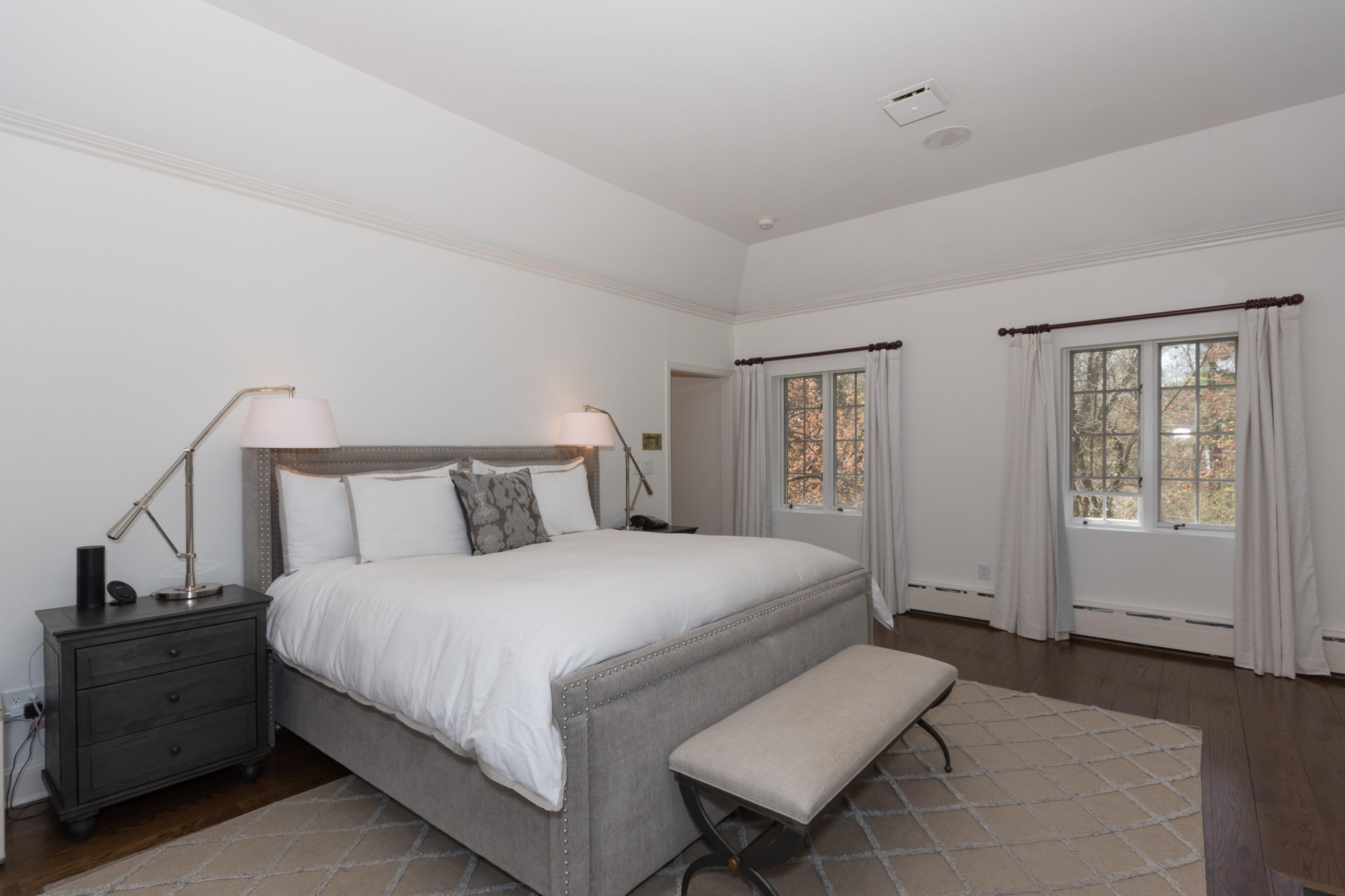 170 Ridge Acres Road Darien, CT 06820 - Photo 18 of 50 a bedroom with a bed and window