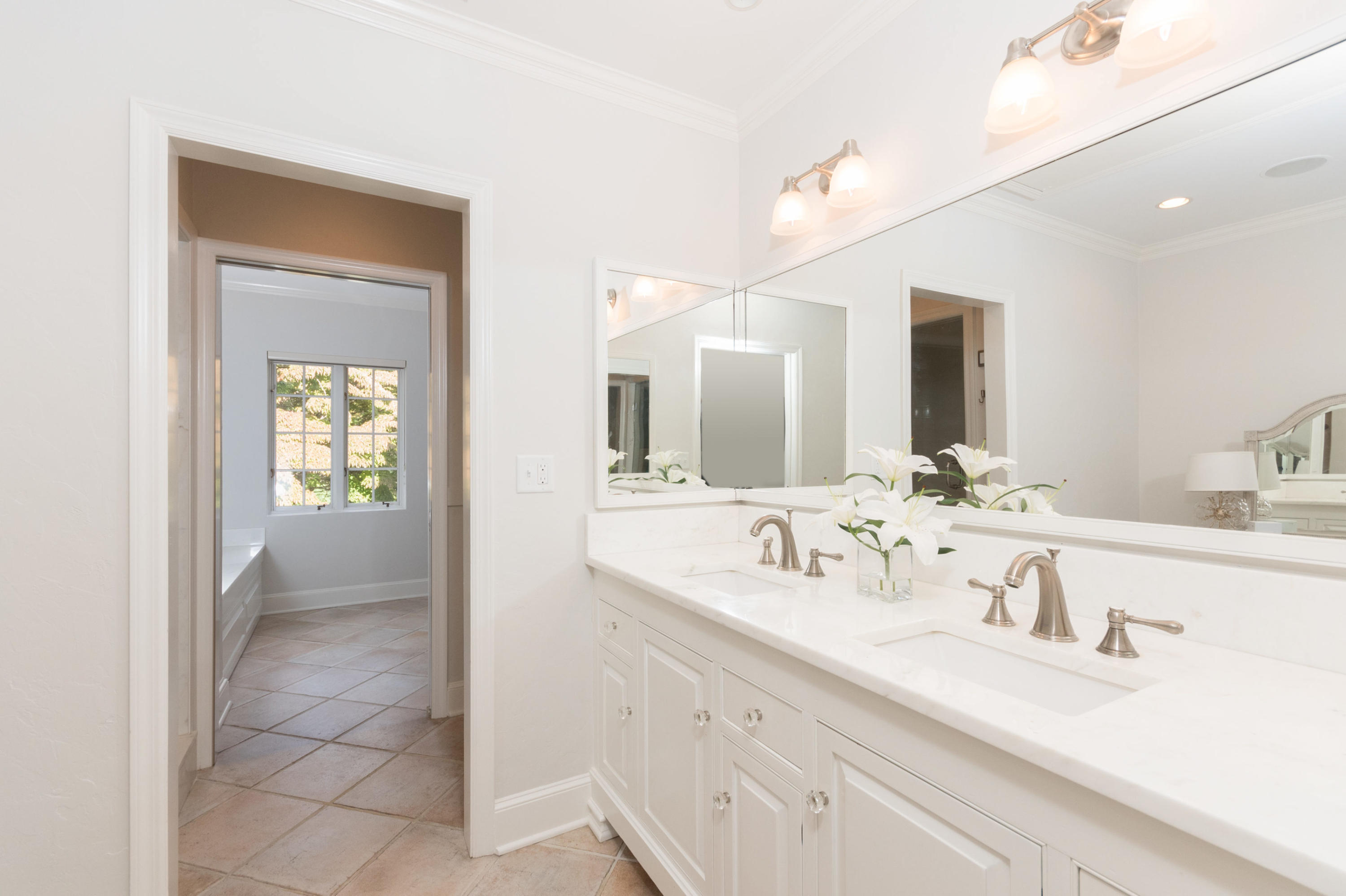 170 Ridge Acres Road Darien, CT 06820 - Photo 21 of 50 a bathroom with a sink and a mirror