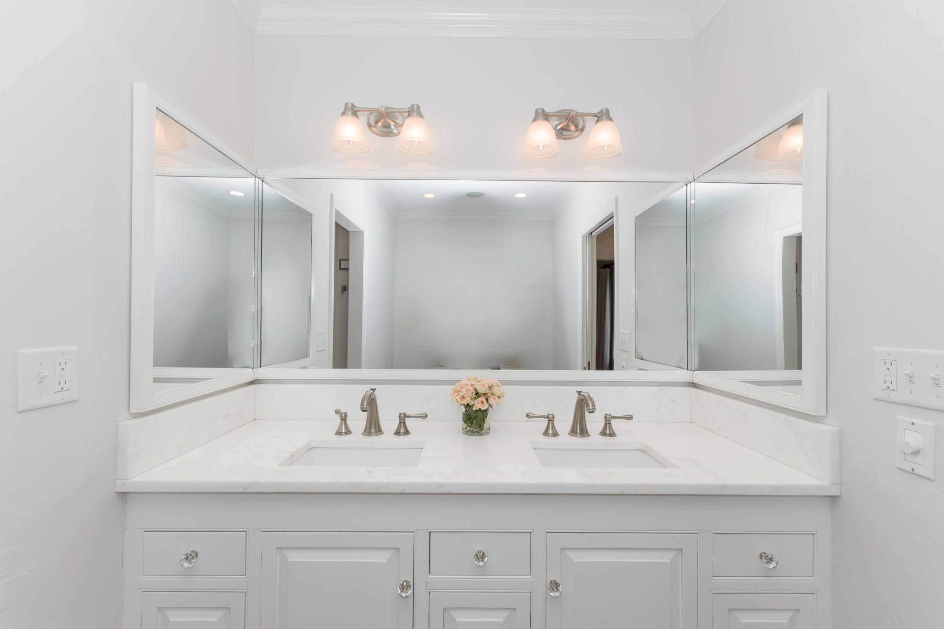 170 Ridge Acres Road Darien, CT 06820 - Photo 22 of 50 a bathroom with a sink and a mirror